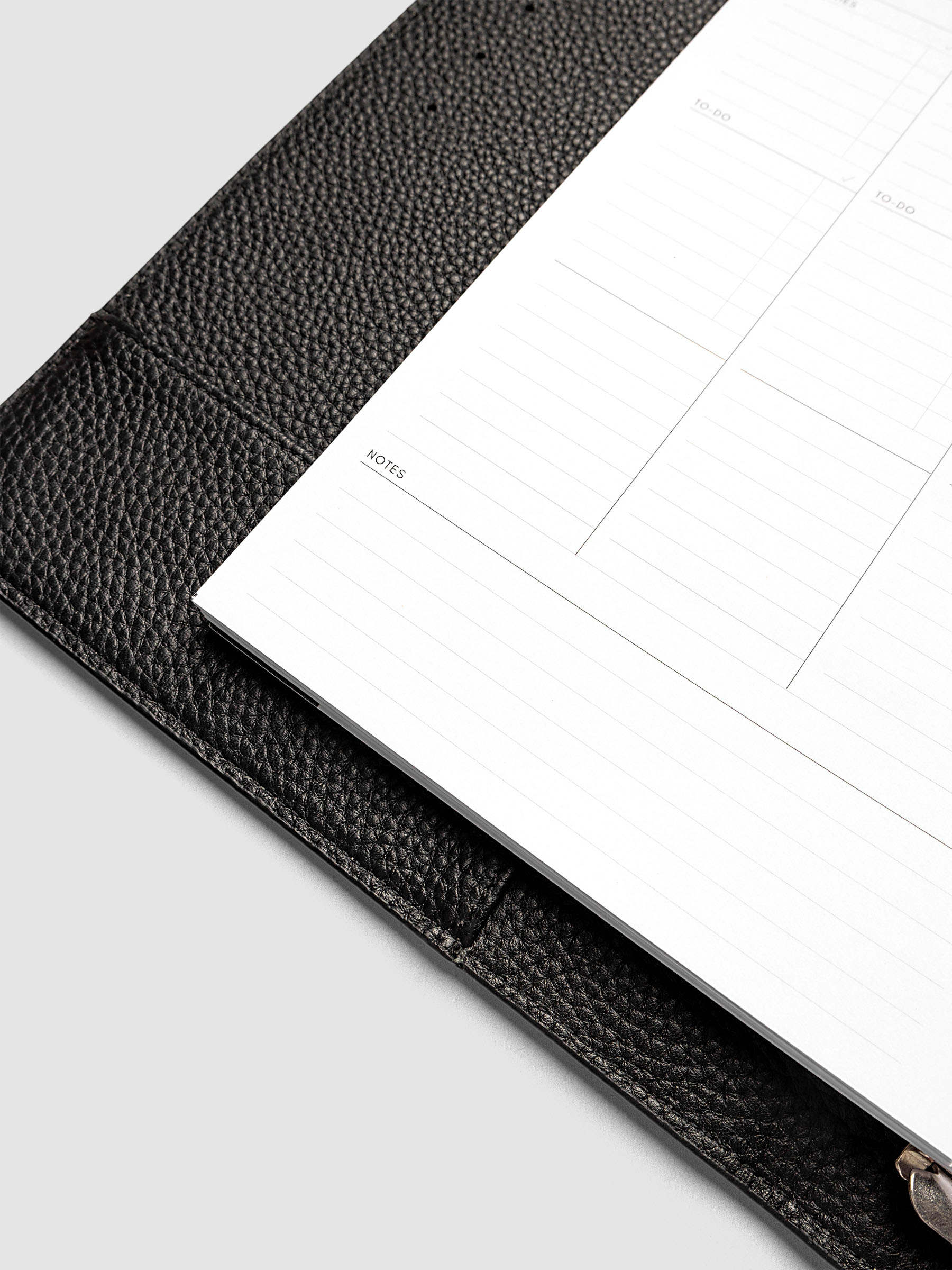 2027 Dated Weekly Task Planner Inserts, Monday Start, A5 6-Ring Punch, close-up of the bottom of the left page showing open daily notes space and the weekly notes section along the bottom of the spread