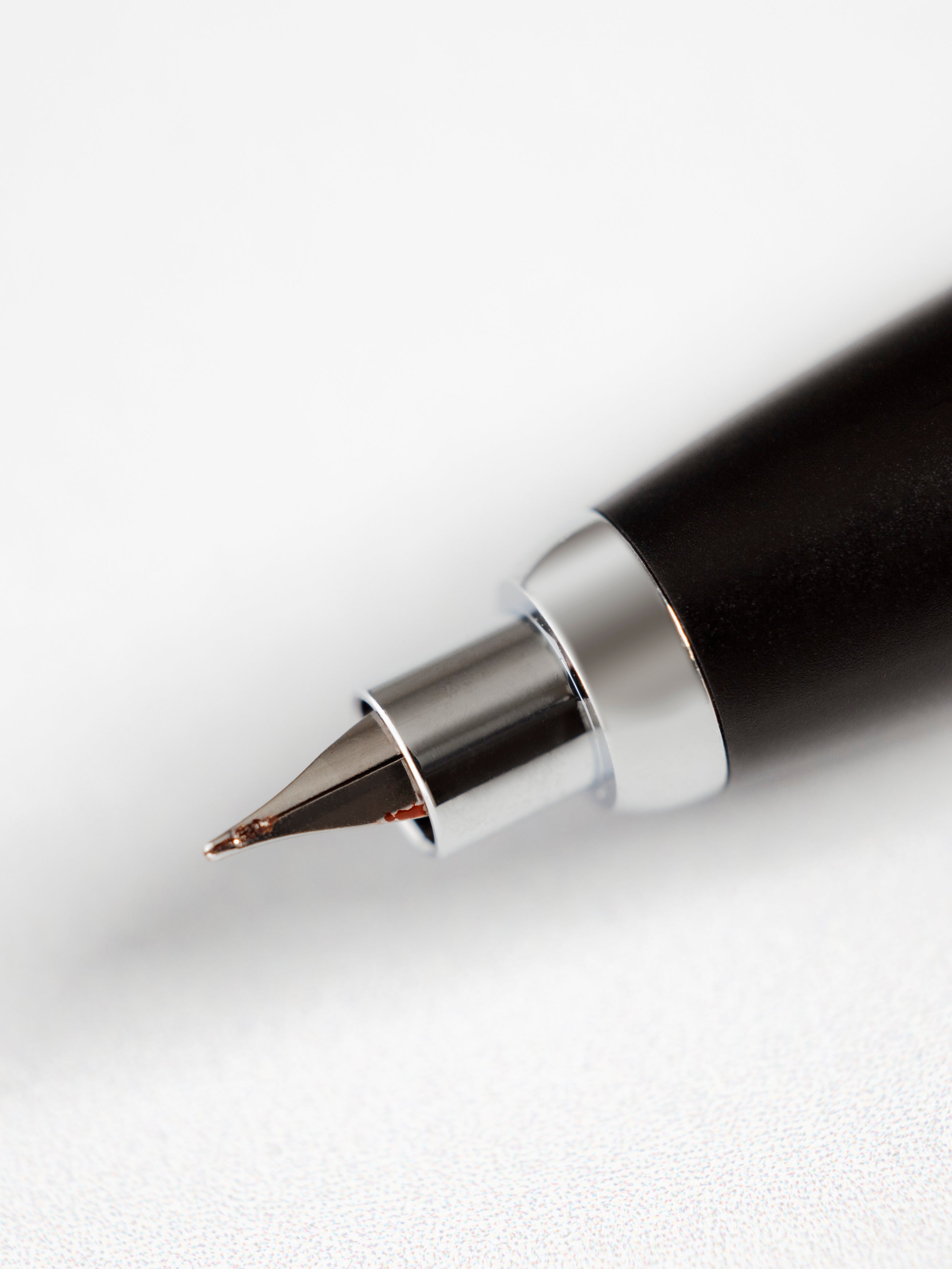 Close-up of the Lanbitou Fountain Pen hooded extra-fine nib, showing iridium tip detail