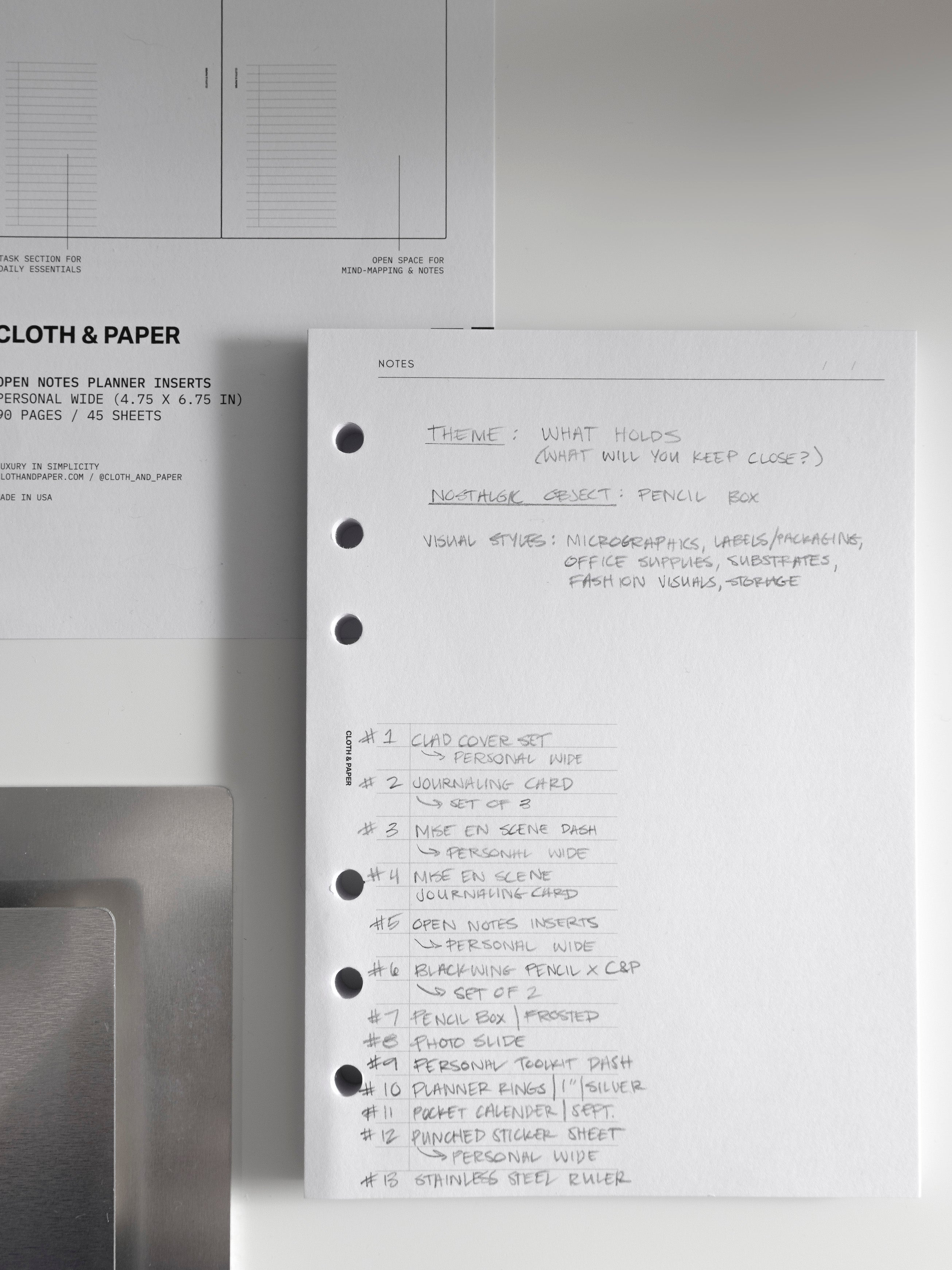 Open planner insert showing handwritten collection notes alongside a Personal Wide Clad Cover Set, open notes insert pages, and additional planner components