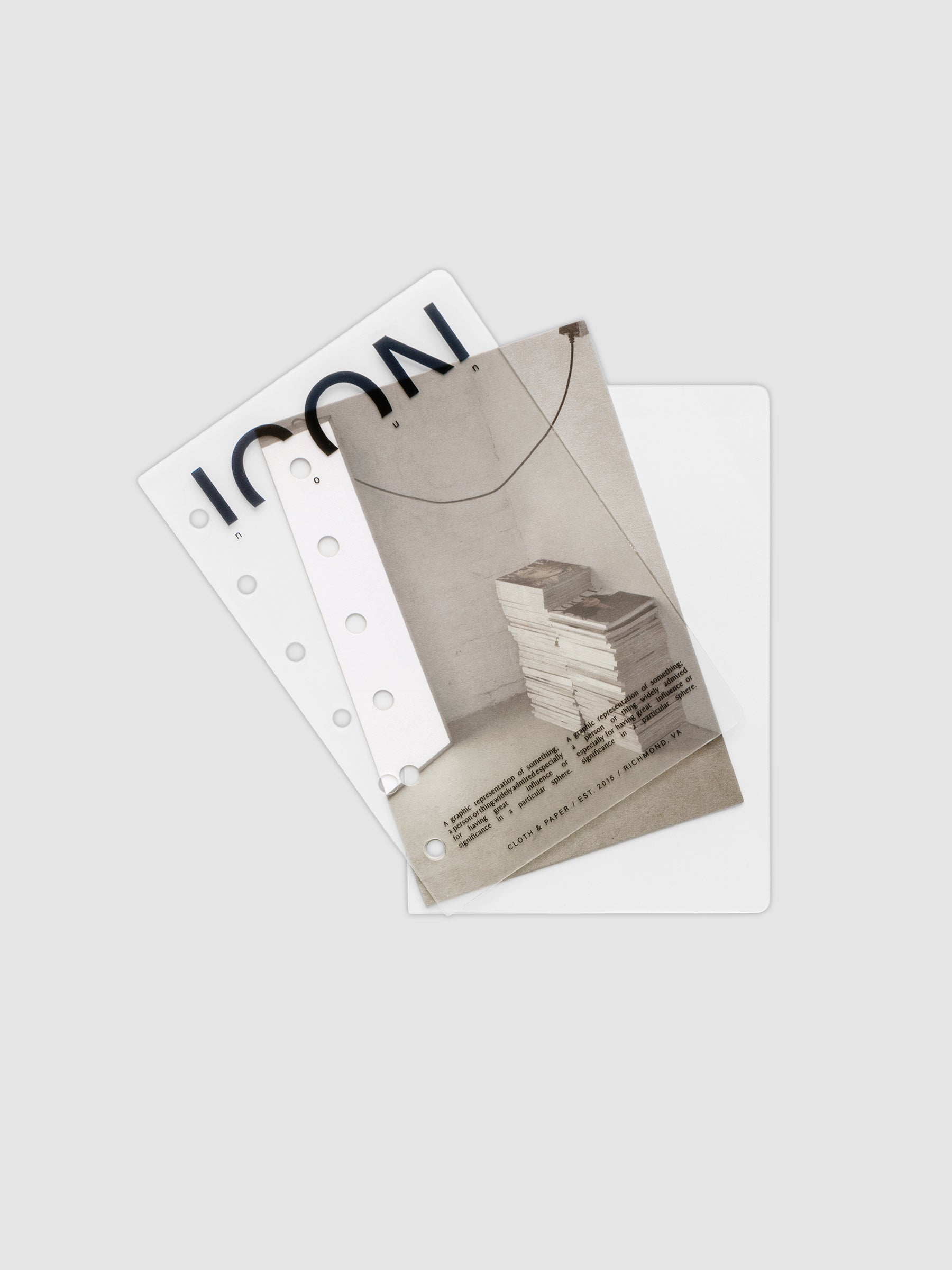 Clear planner cover with black text and a photographic dashboard shown pre-punched for 6-ring planners in size Pocket.