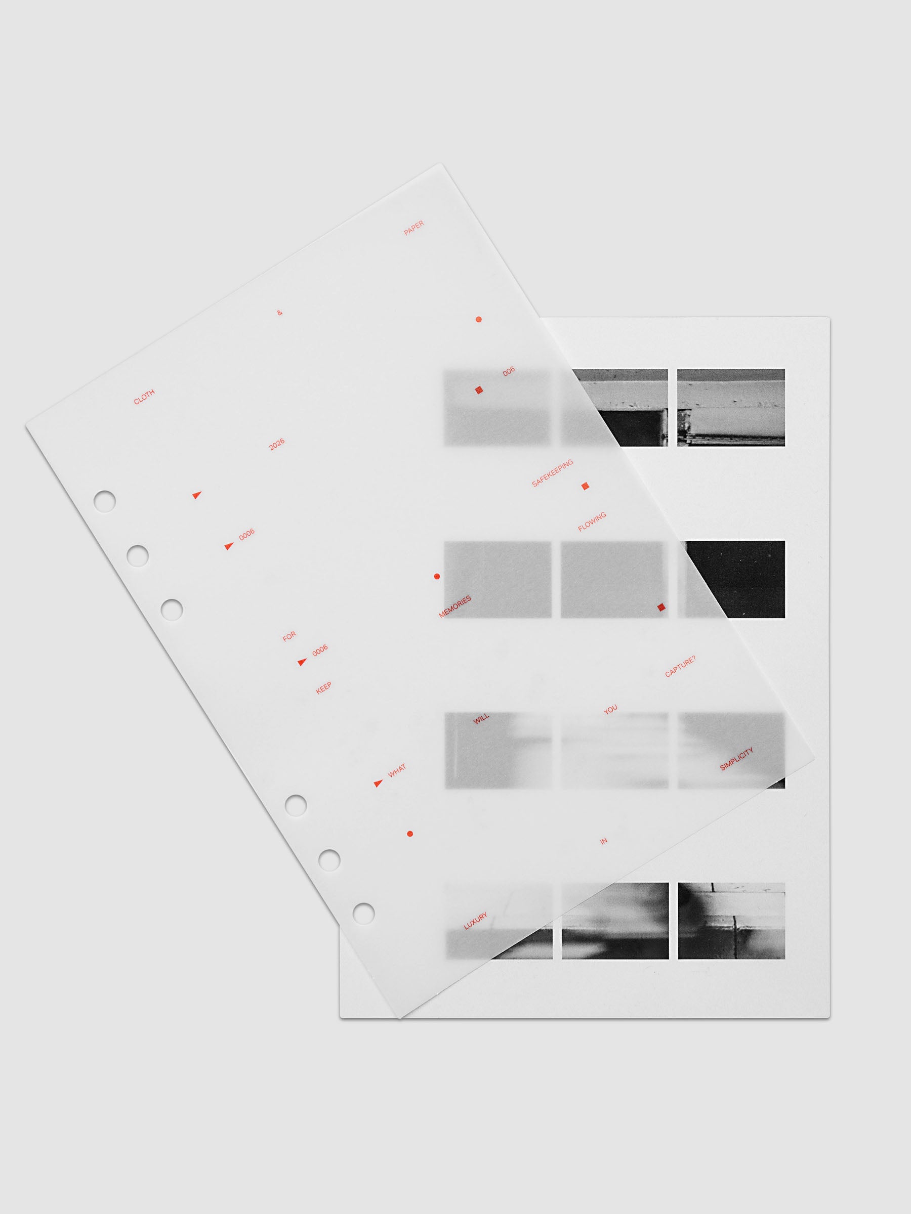 Film Strip Planner Dashboard Duo A5 6-Ring Punch two dashboards offset showing layered vellum and film strip plastic with deep orange printed details