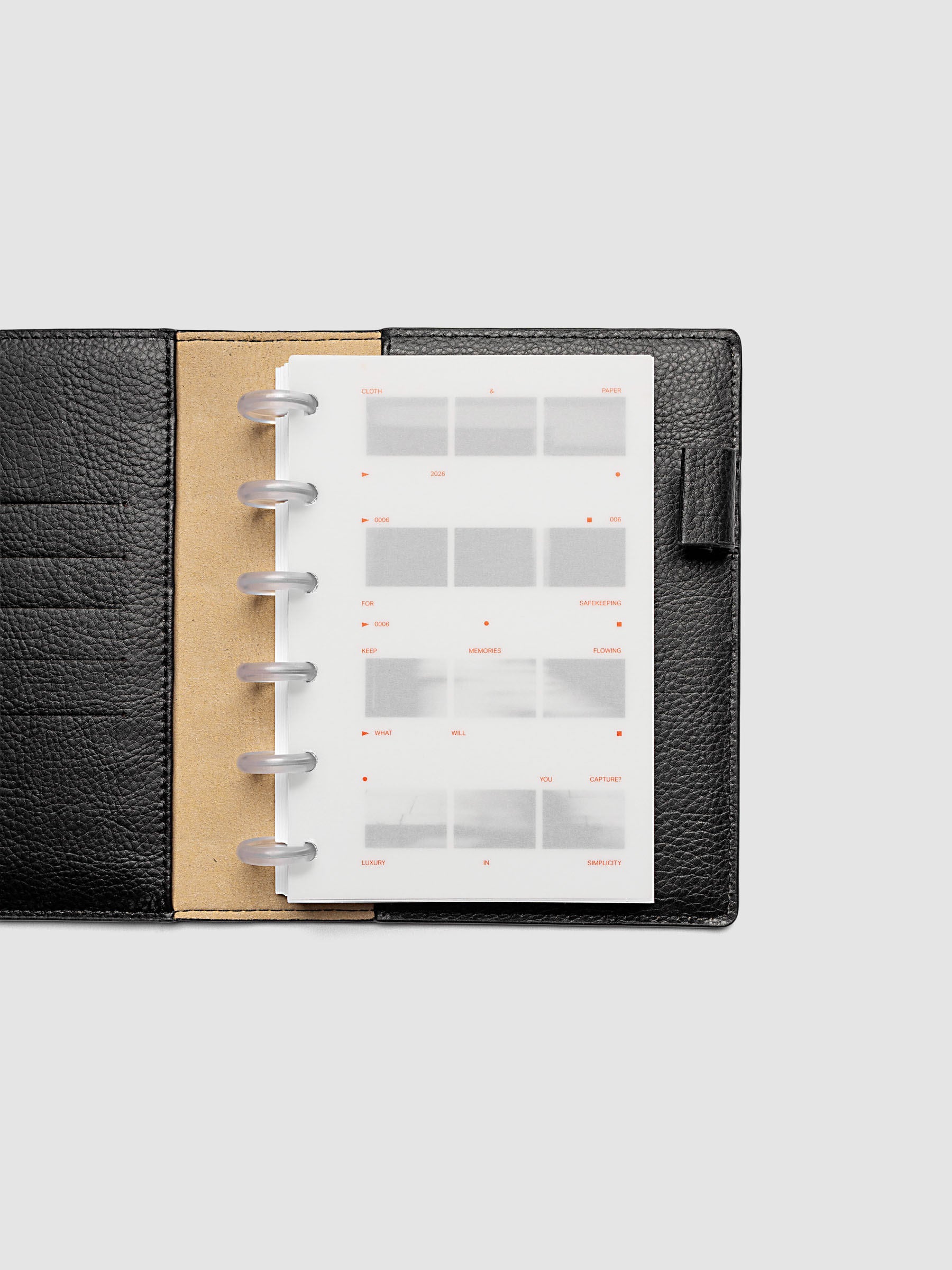 Film Strip Planner Dashboard Duo CP Petite 6-Disc Punch 6-Ring Punch both dashboards layered inside a planner showing film strip design and semi-transparent vellum overlay