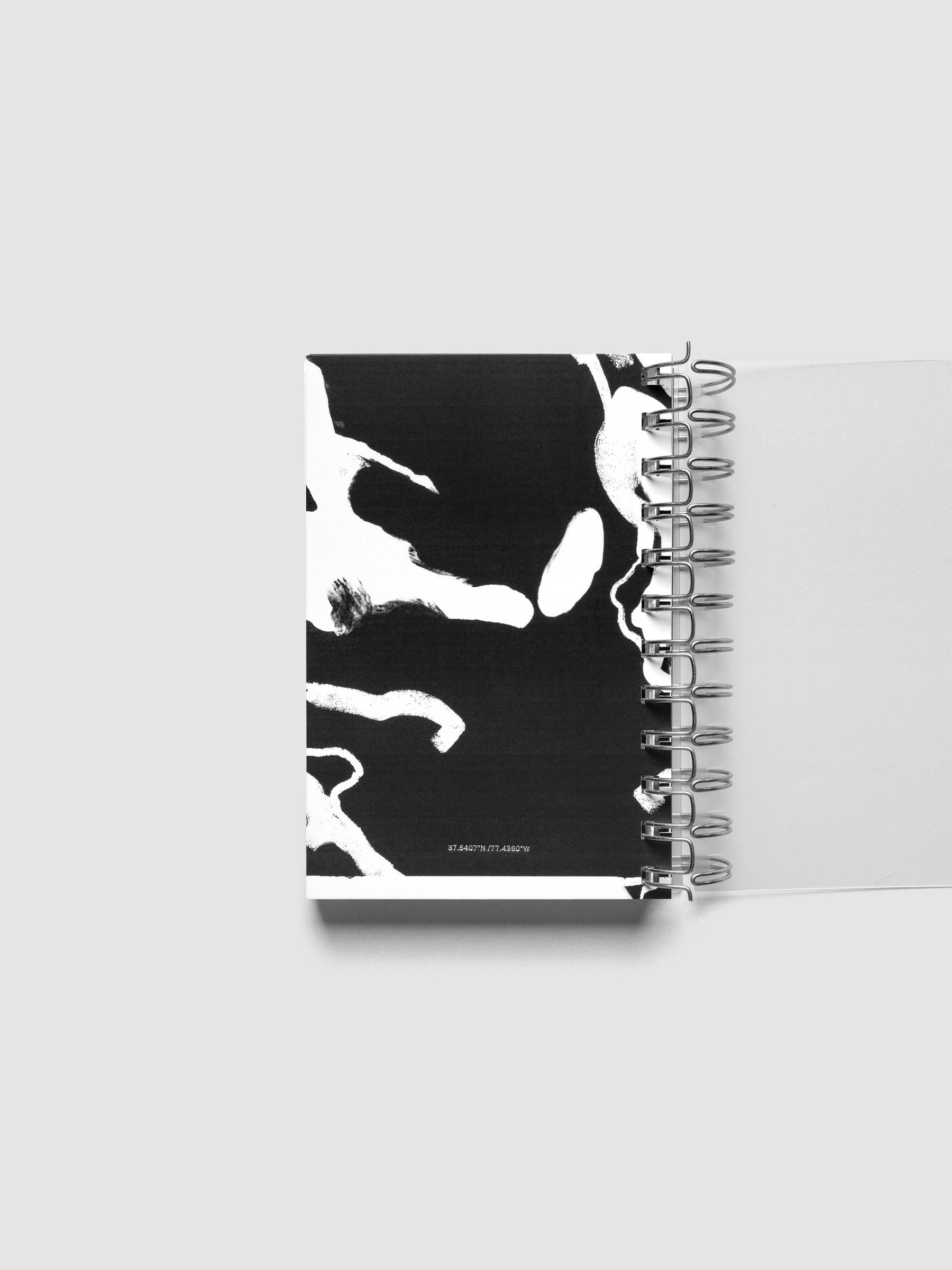 Spiral Notebook dashboard in the pattern Drybrush shown in size CP Petite inside a notebook.