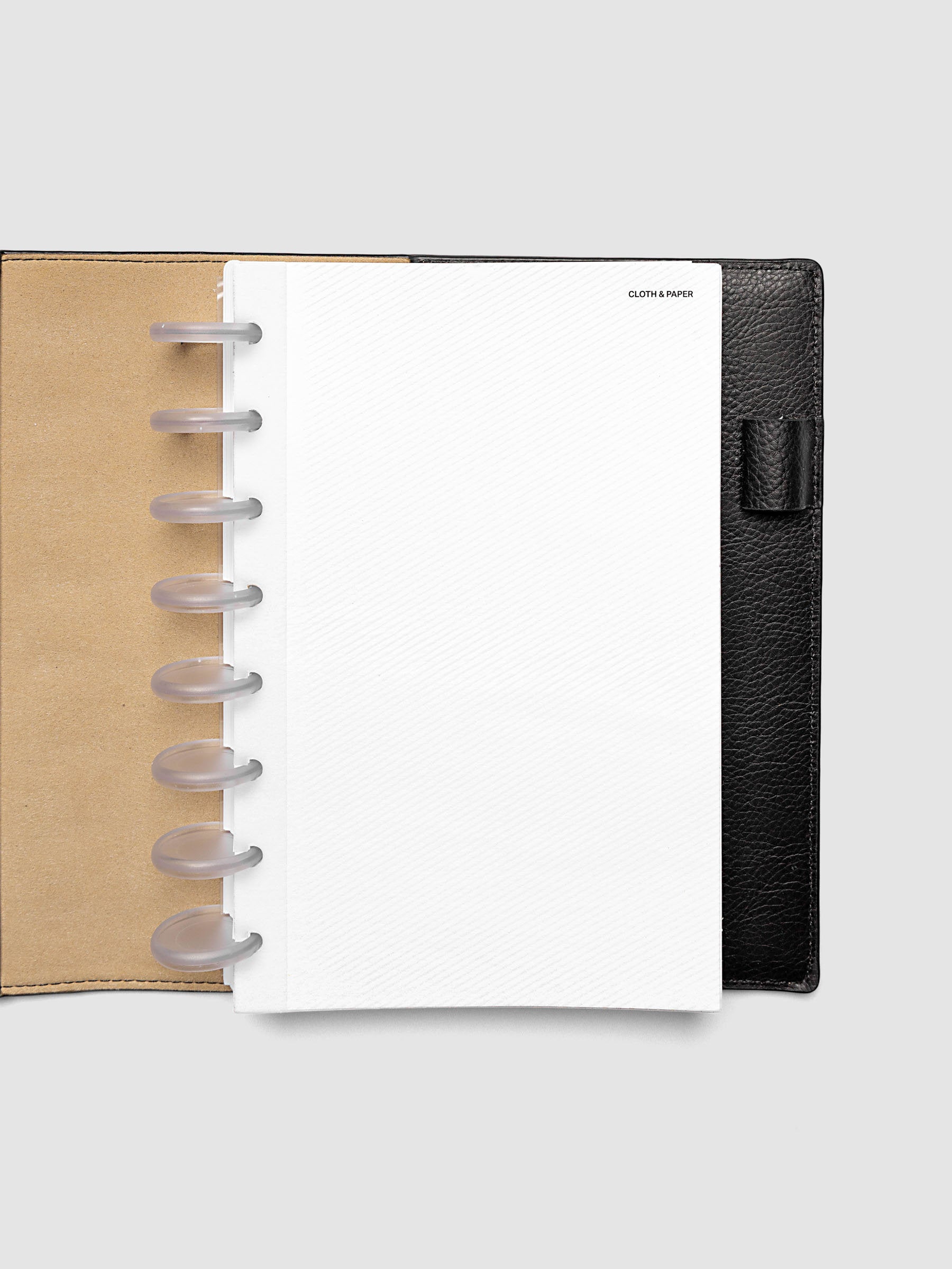 Folded Collage Planner Dashboard, Half Letter 8-Disc Punch, dashboard shown inserted in a planner