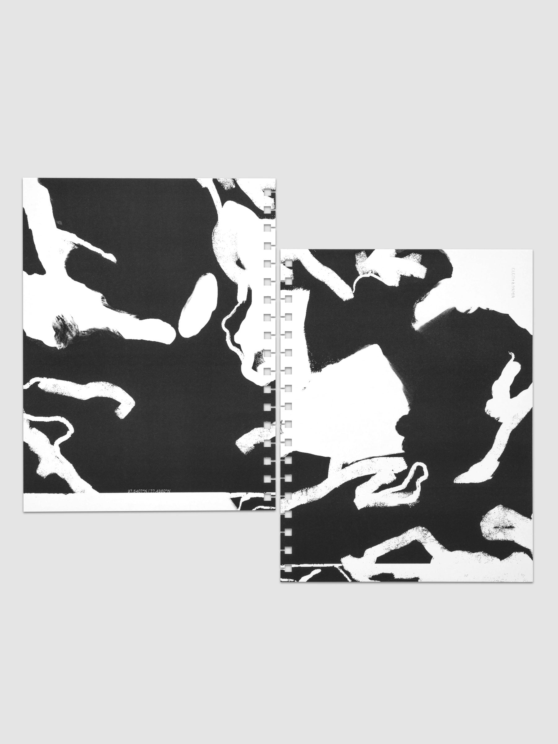 Front and back Spiral Notebook dashboards in the pattern Drybrush shown in size HP Classic against a neutral background.
