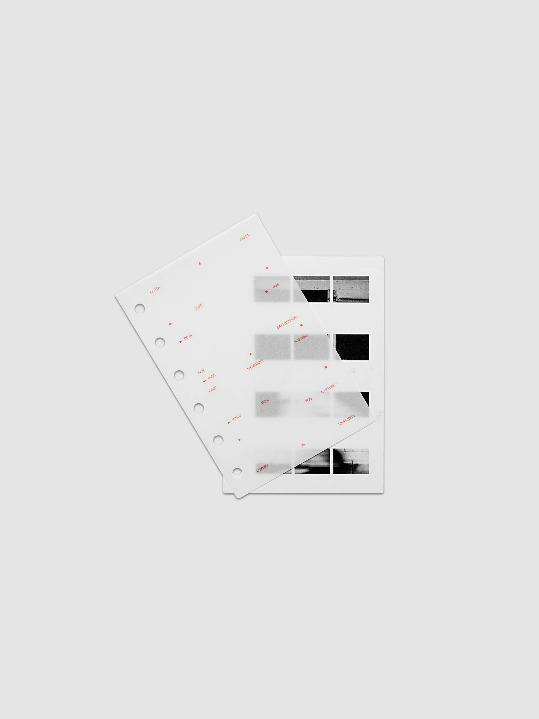 Film Strip Planner Dashboard Duo Pocket 6-Ring Punch two dashboards offset showing layered vellum and film strip plastic with deep orange printed details