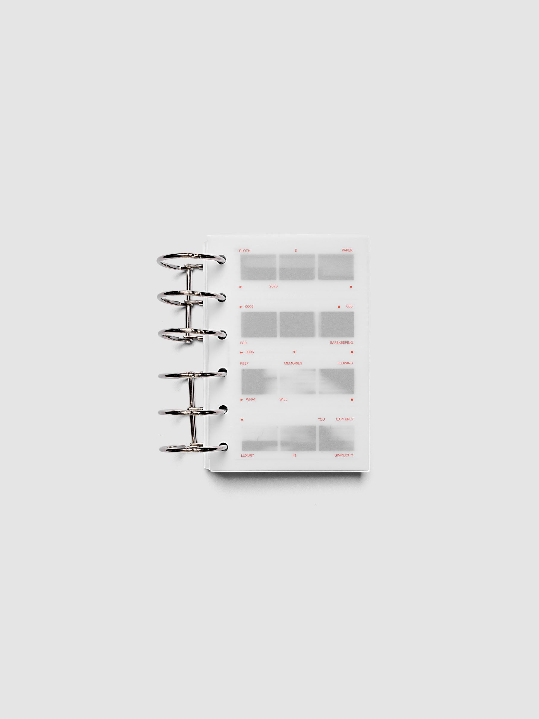 Film Strip Planner Dashboard Duo Pocket 6-Ring Punch both dashboards layered inside a planner showing film strip design and semi-transparent vellum overlay