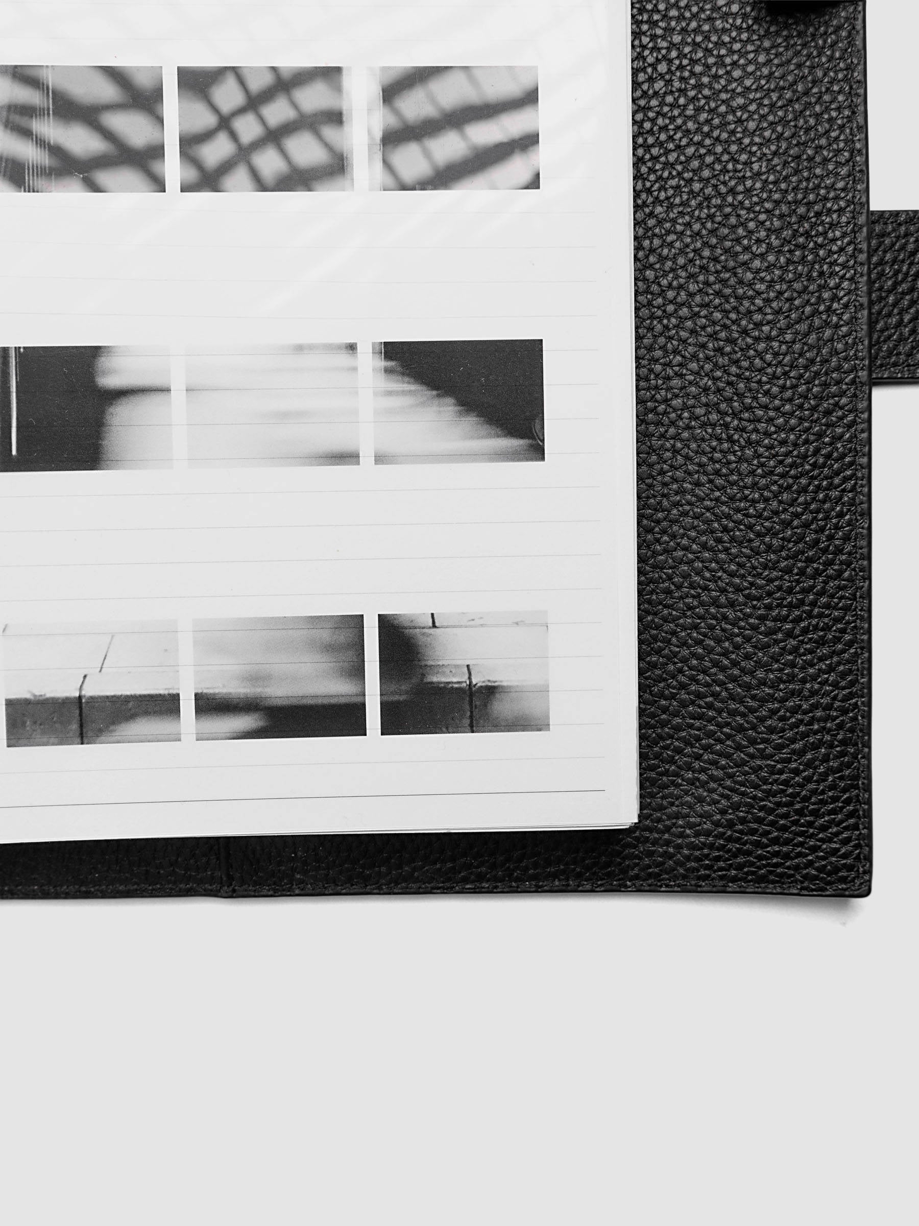 Film Strip Planner Dashboard Duo A5 6-Ring Punch bottom right close-up of film strip plastic bottom dashboard inside a planner