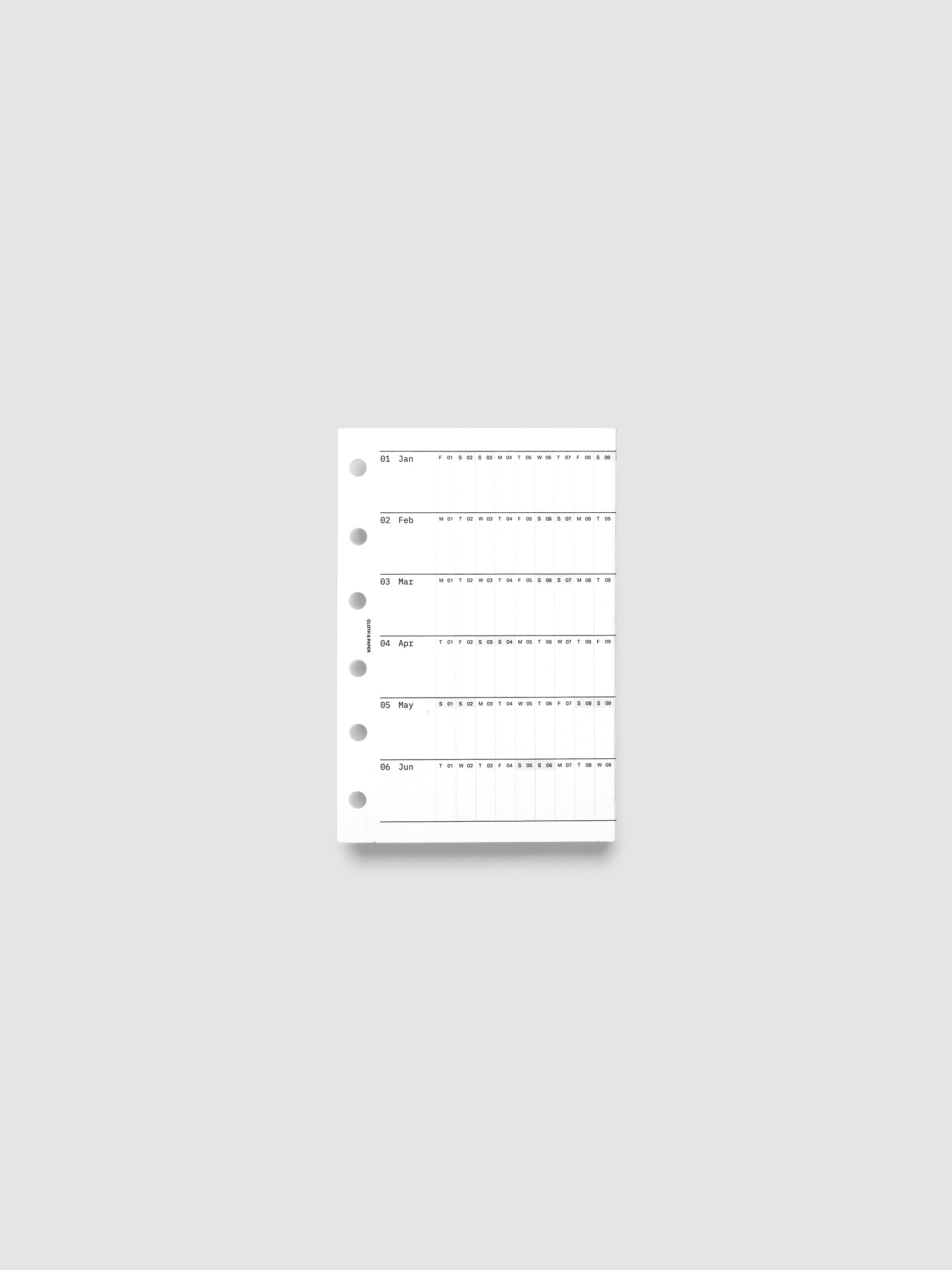 Pocket 6-Ring Punch 2027 Dated Fold Out Insert shown folded closed, displaying the cover side on a flat surface.