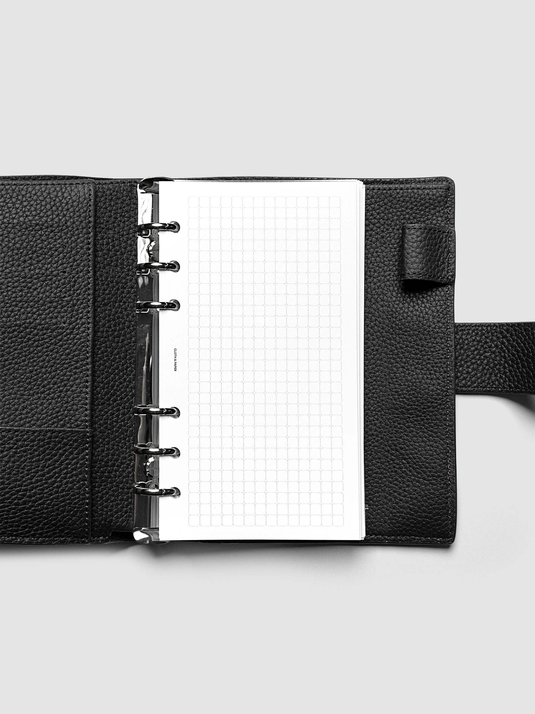 Rounded Graph Planner Insert Personal 6-Ring Punch open to an unused grid page
