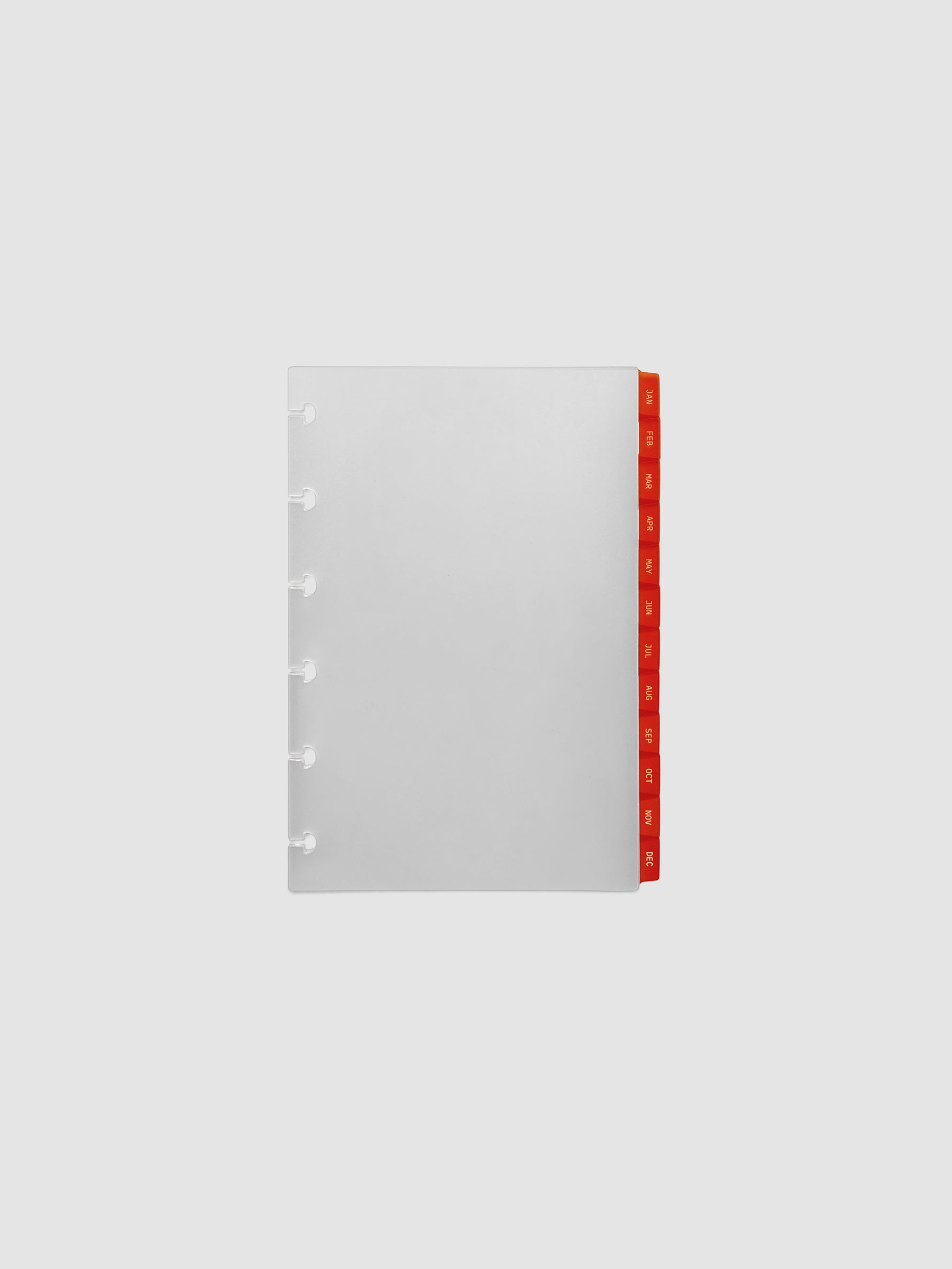 CP Petite 6-Disc Punch Ultra-Thin Monthly Dividers in deep orange, set of 12 dividers fanned to show all months