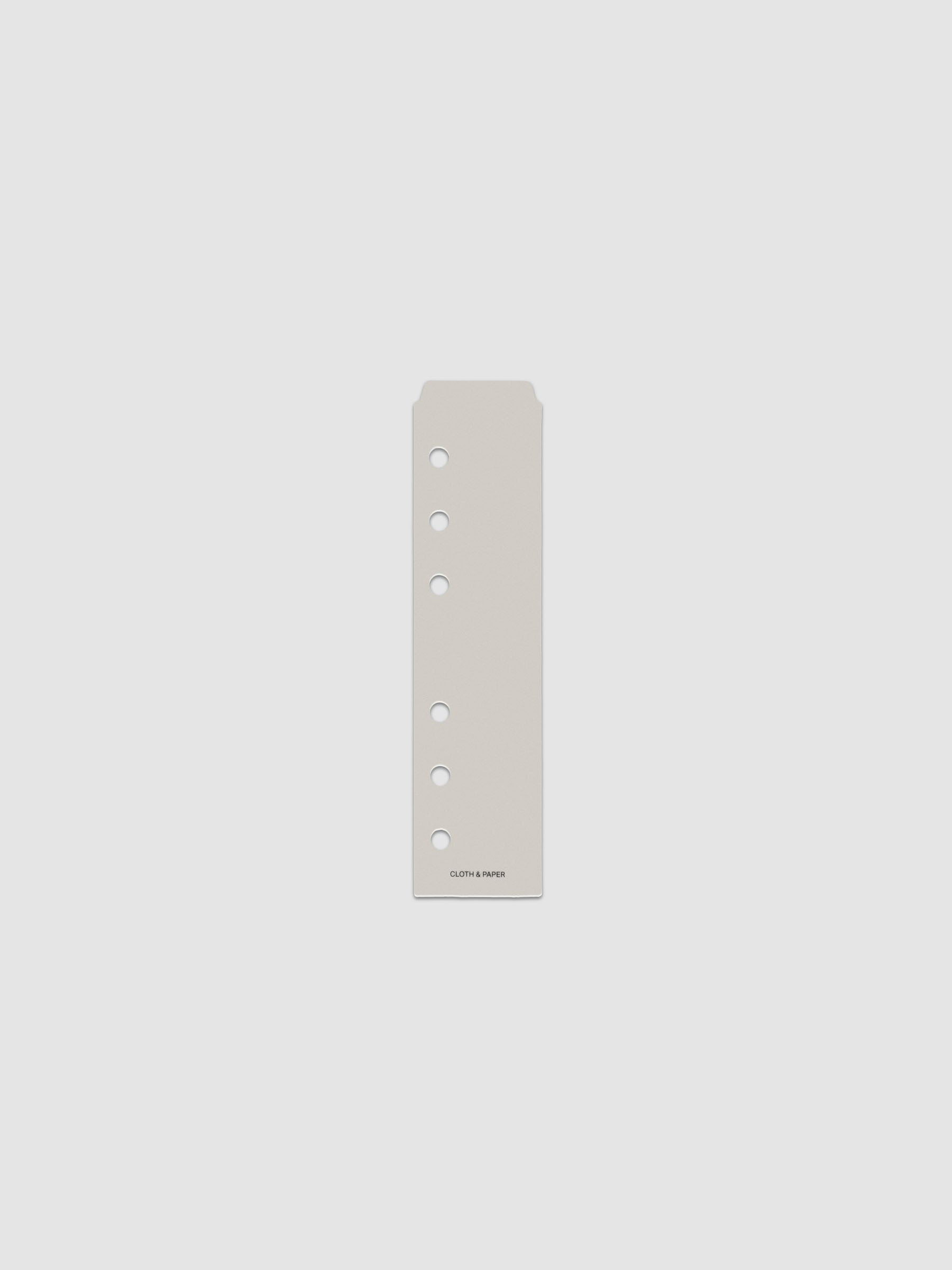 One narrow page marker in grey, shown in size A6.