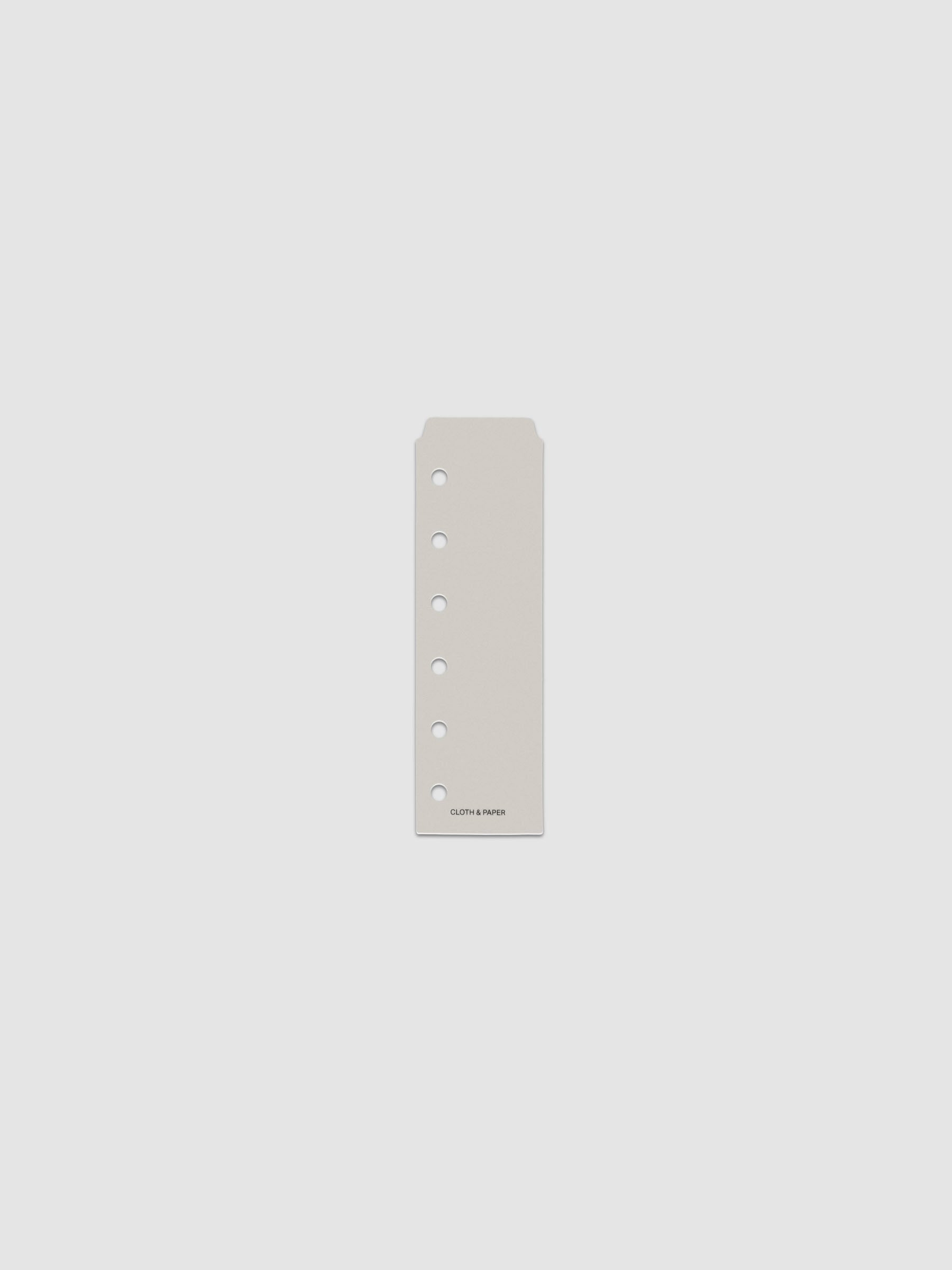 One narrow page marker in grey, shown in size Pocket.