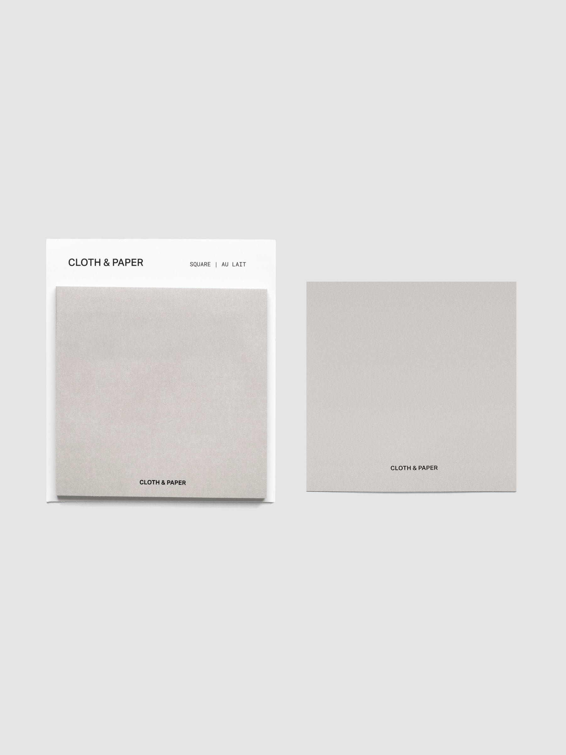 Square Matte Sticky Notes in light beige shown with backing card and loose sheet
