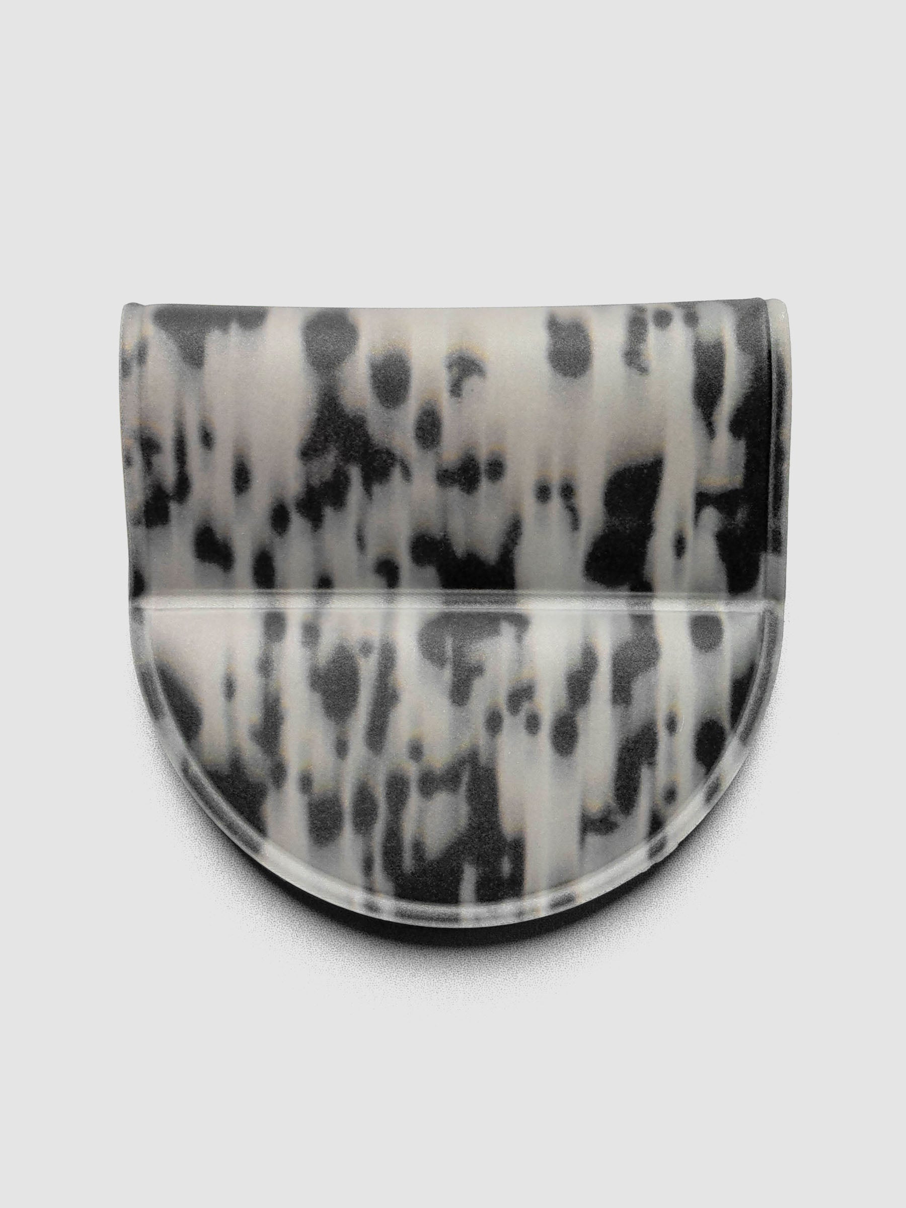 Magnetic Bookmark | Pen Holder | Vinyl in Blurred Ink, front view showing black and off-white speckled pattern