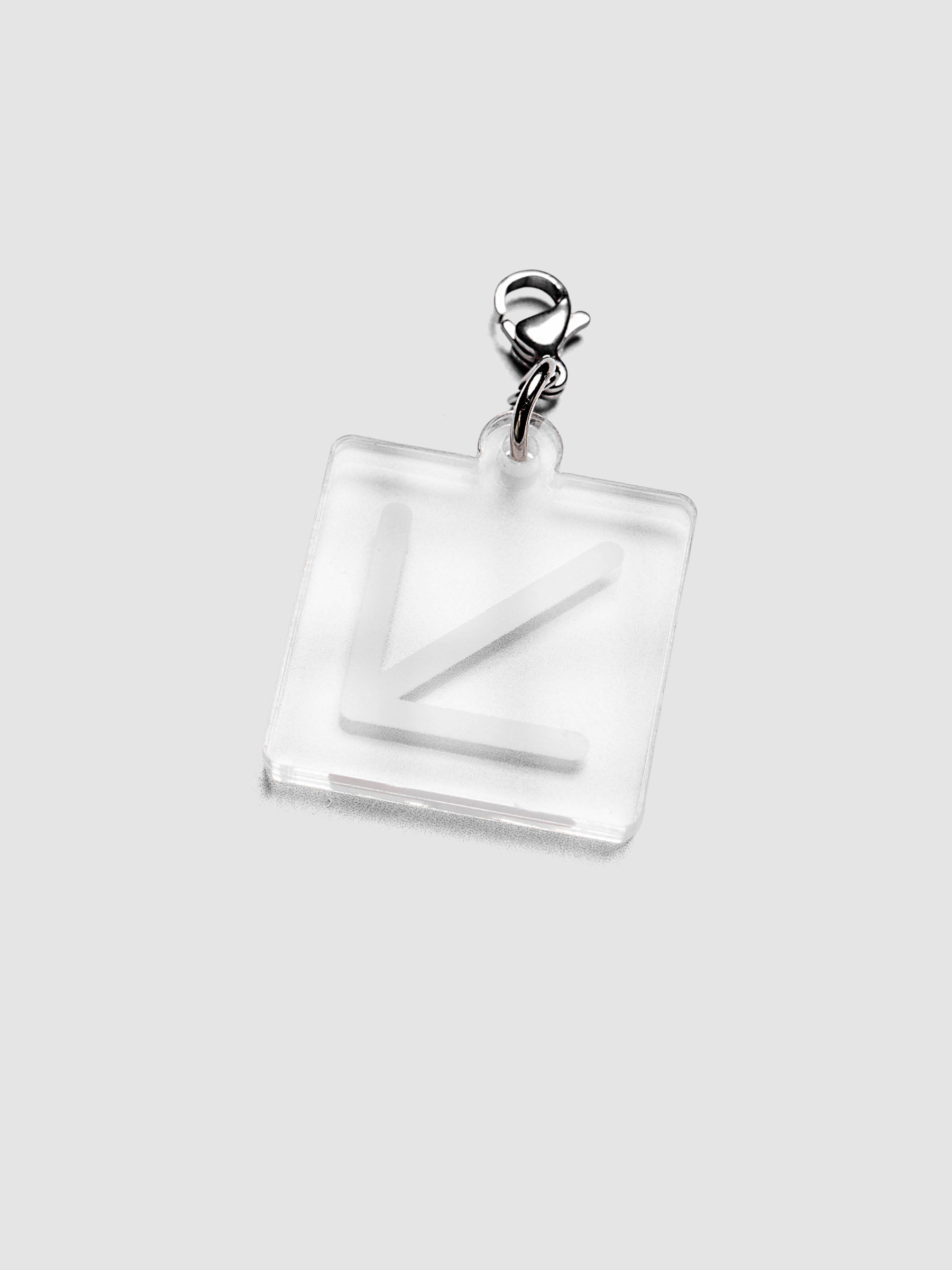 Travel Notebook Charms ARROW charm in translucent white plastic with lobster clasp attachment