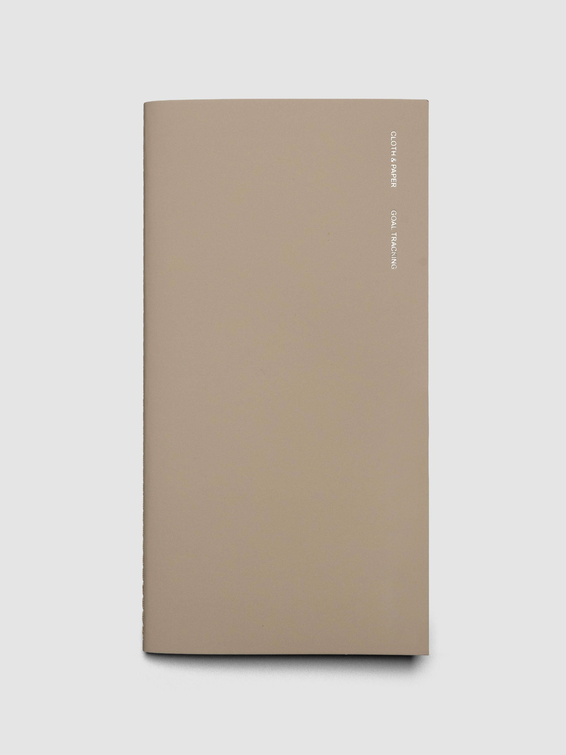 Travel Notebook in size A5 Slim in color Ibiza with Goal Tracking pages shown closed.