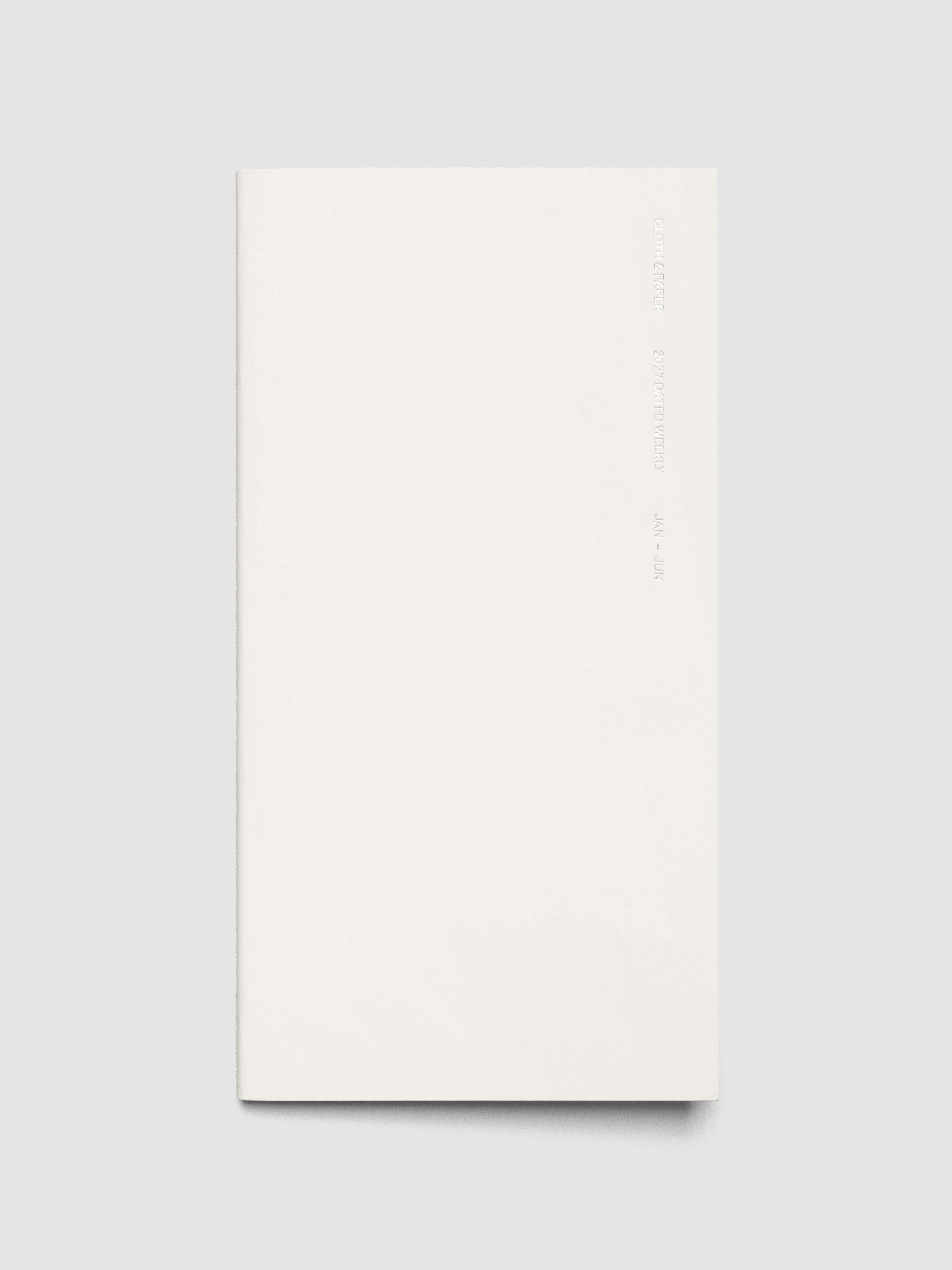 Closed Jan–Jun 2027 Dated Travel Notebook in A5 Slim size, showing the off-white cover with silver foil text