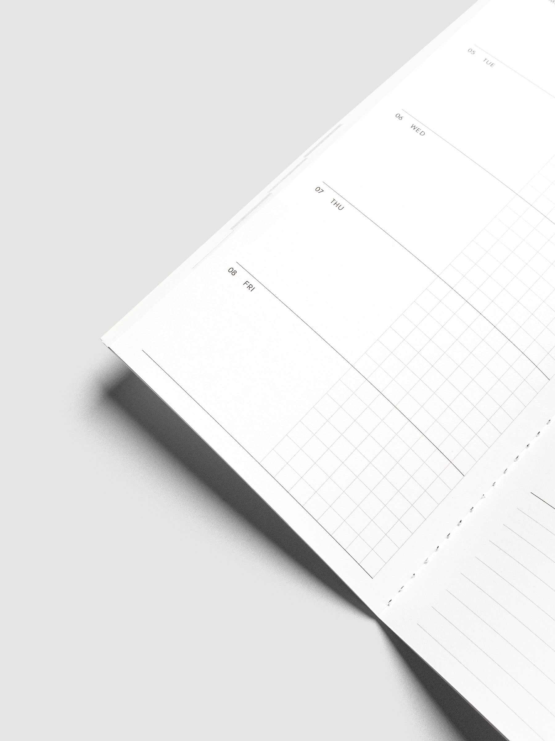 Close-up of the bottom of the left page of the Jul–Dec 2027 Dated Travel Notebook, showing the lower portion of the split daily columns