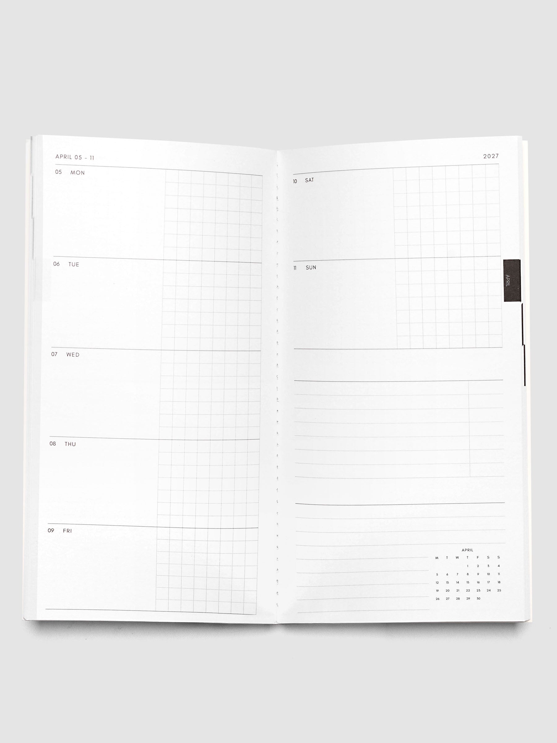 Open Jan–Jun 2027 Dated Travel Notebook showing the full weekly spread, with split daily columns on the left page and weekend dates, task section, notes section, and month-at-a-glance on the right