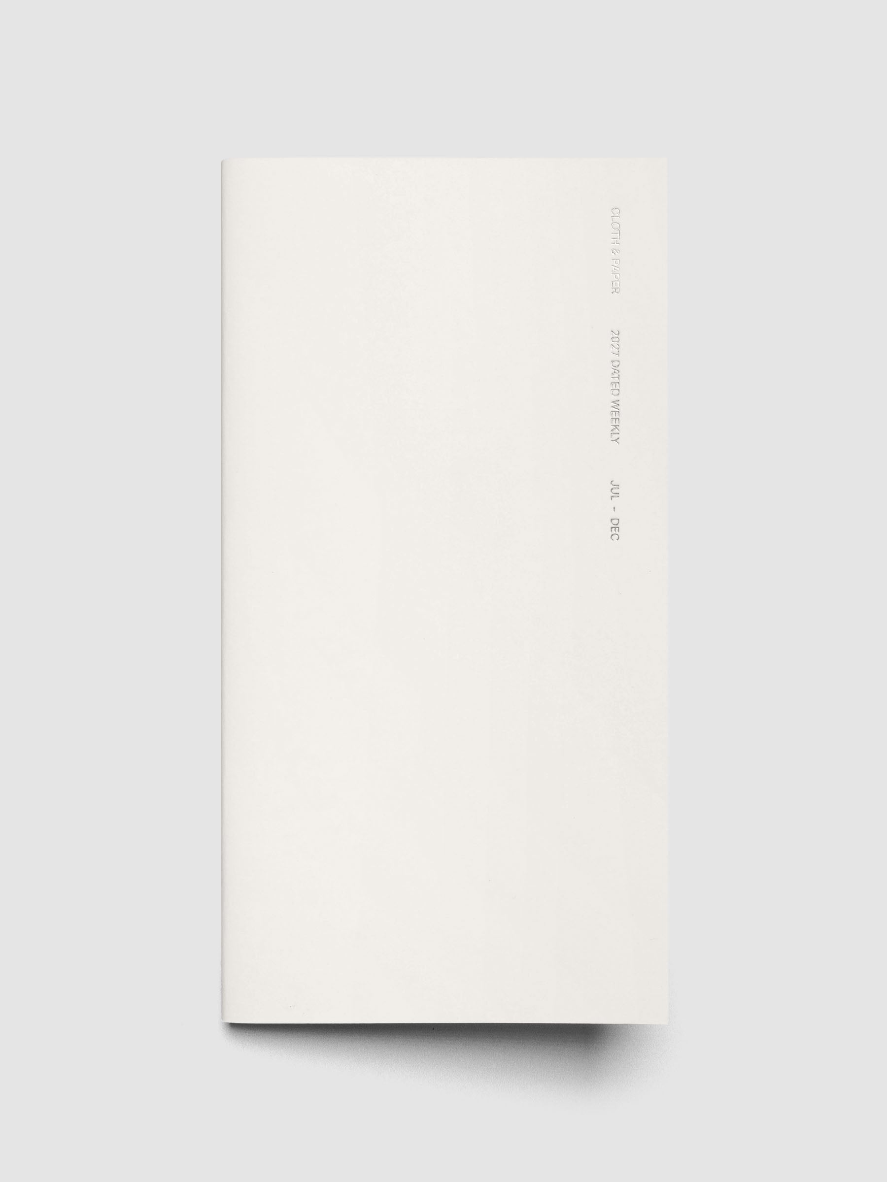 Closed Jul–Dec 2027 Dated Travel Notebook in A5 Slim size, showing the off-white cover with silver foil text
