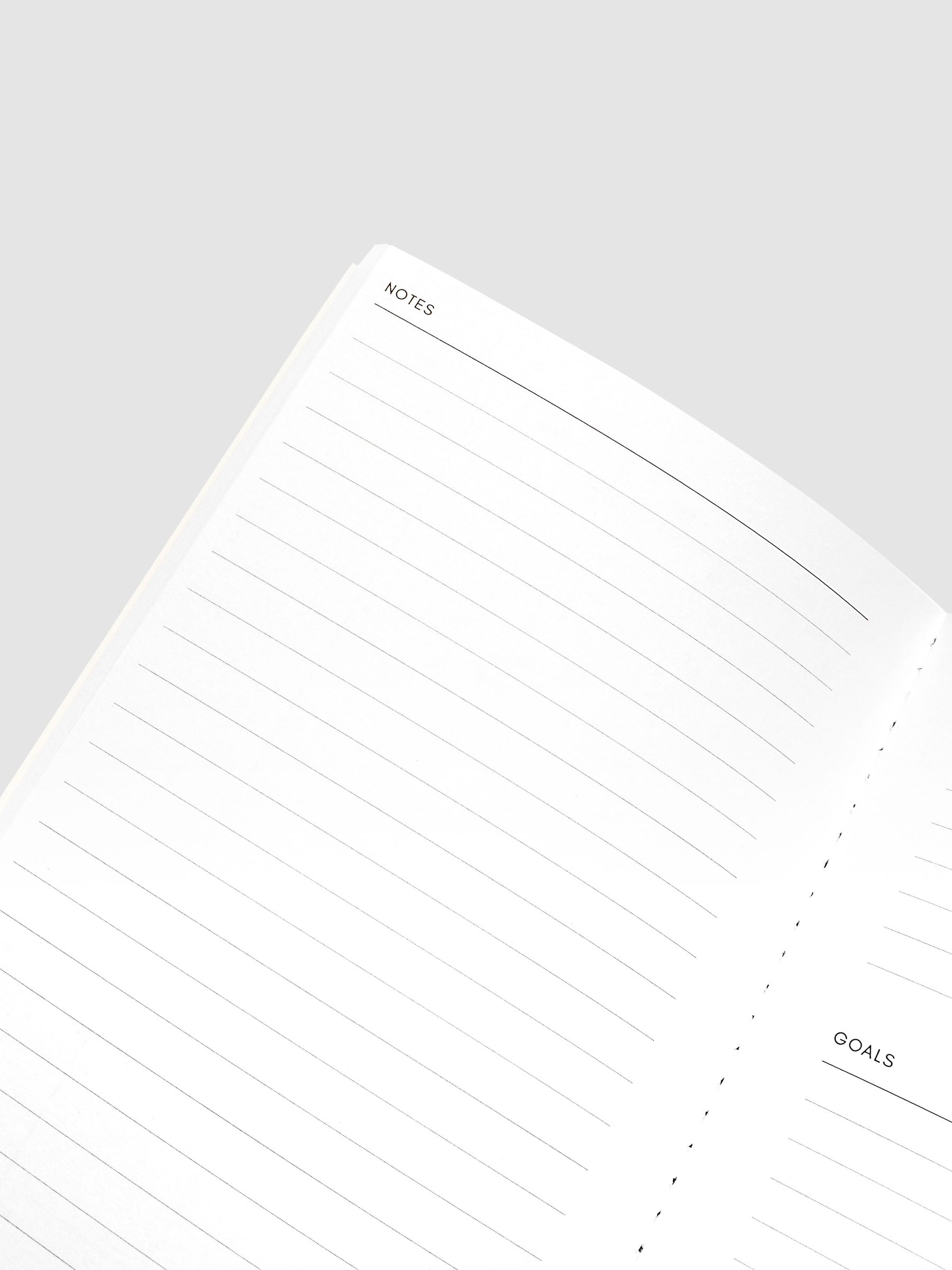Close-up of the top of the left page of the 2027 Dated Travel Notebook Monthly in A5 Slim size, showing the lined notes section