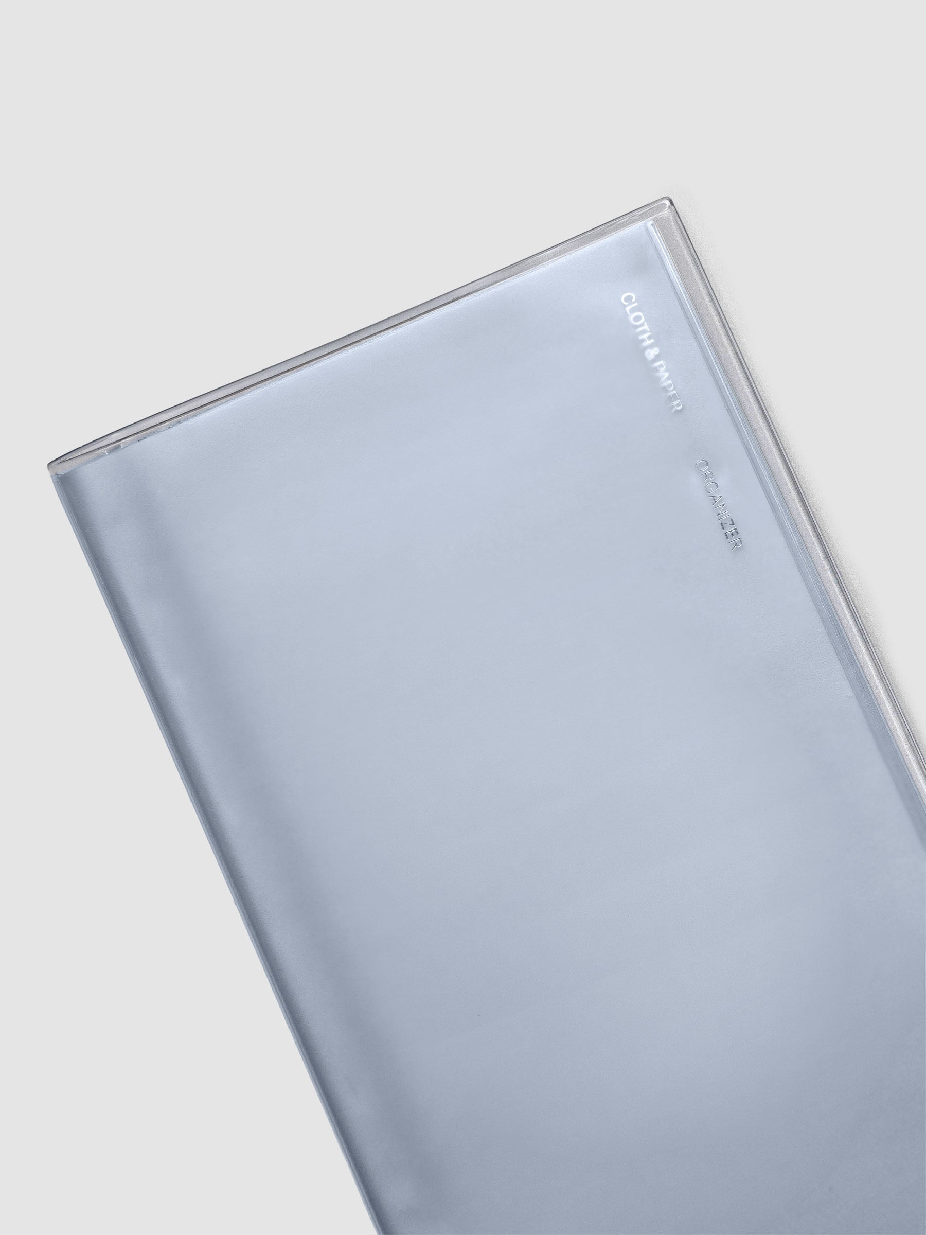 Close up view of A5 Slim sized clear organizer for stickers or ephemera with a clear vinyl cover.