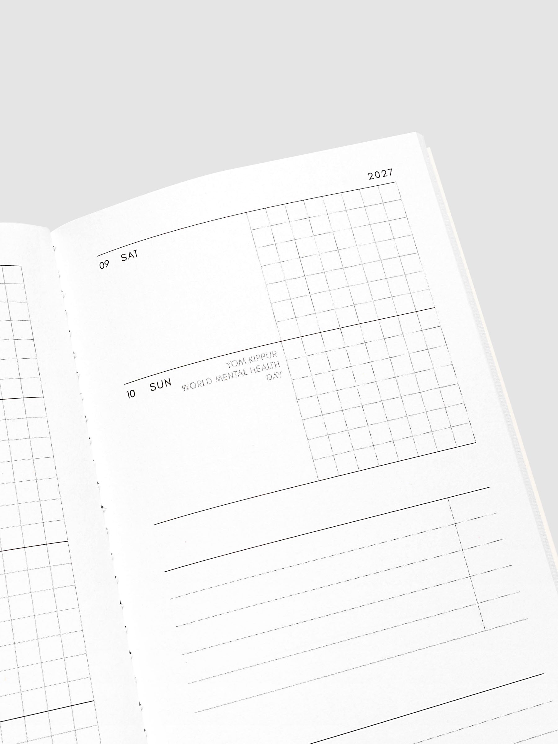 Close-up of the top of the right page of the Jul–Dec 2027 Dated Travel Notebook, showing the weekend dates and task section