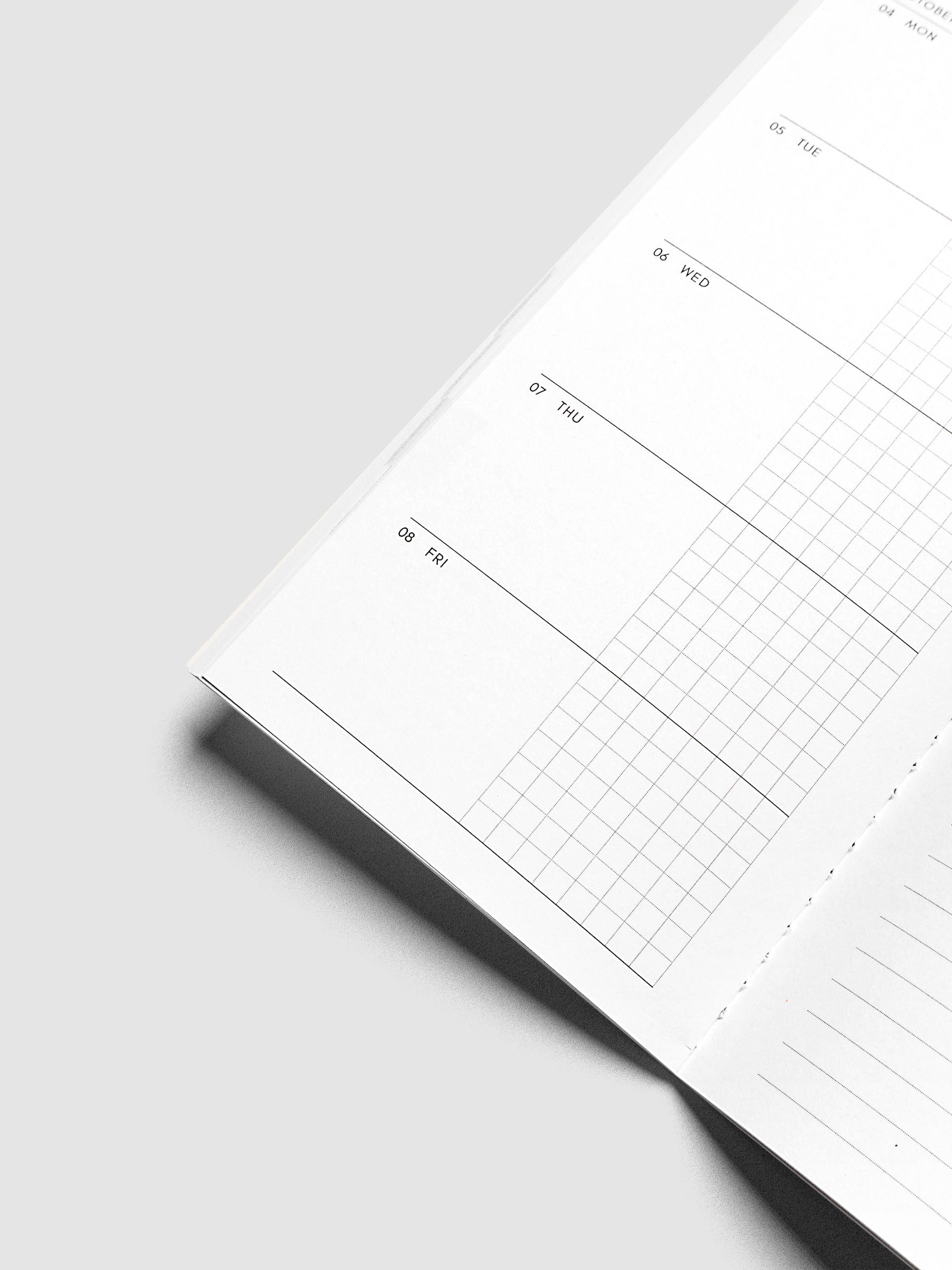 Close-up of the bottom of the left page of the Jul–Dec 2027 Dated Travel Notebook, showing the lower portion of the split daily columns