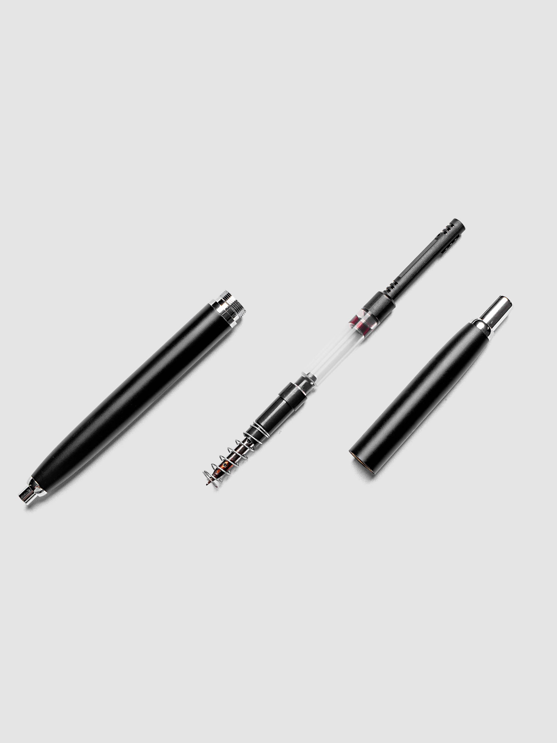 Lanbitou Fountain Pen disassembled to show all components including the stainless steel barrel, hooded nib section, piston converter, and plastic end cap