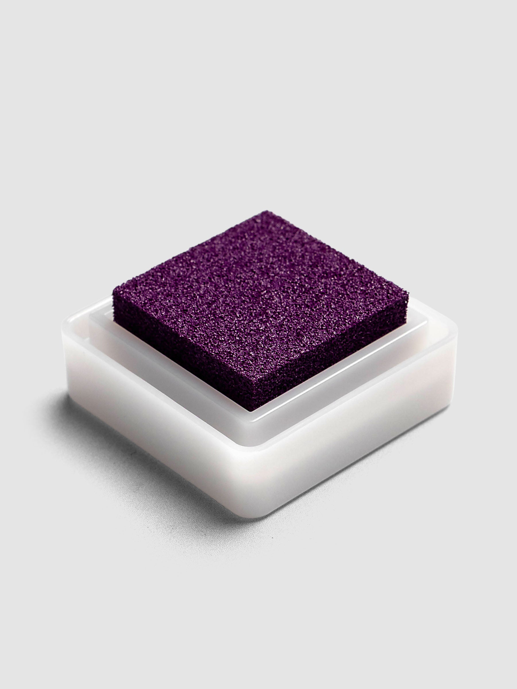 Artnic Stamp Ink Pad in boysenberry seen from the side with cover on