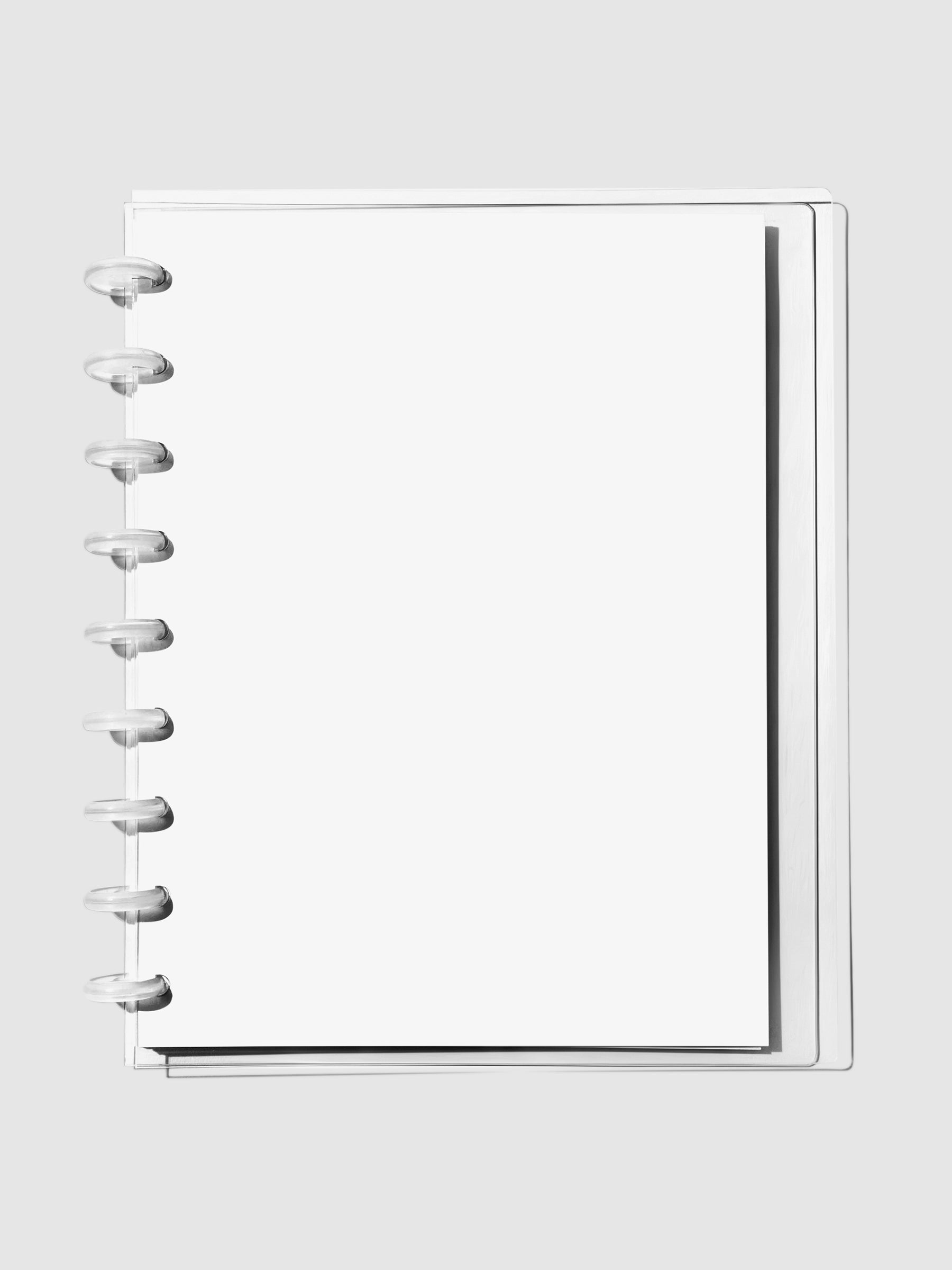 Crystal Clear Discbound Notebook Cover in use with clear rings.