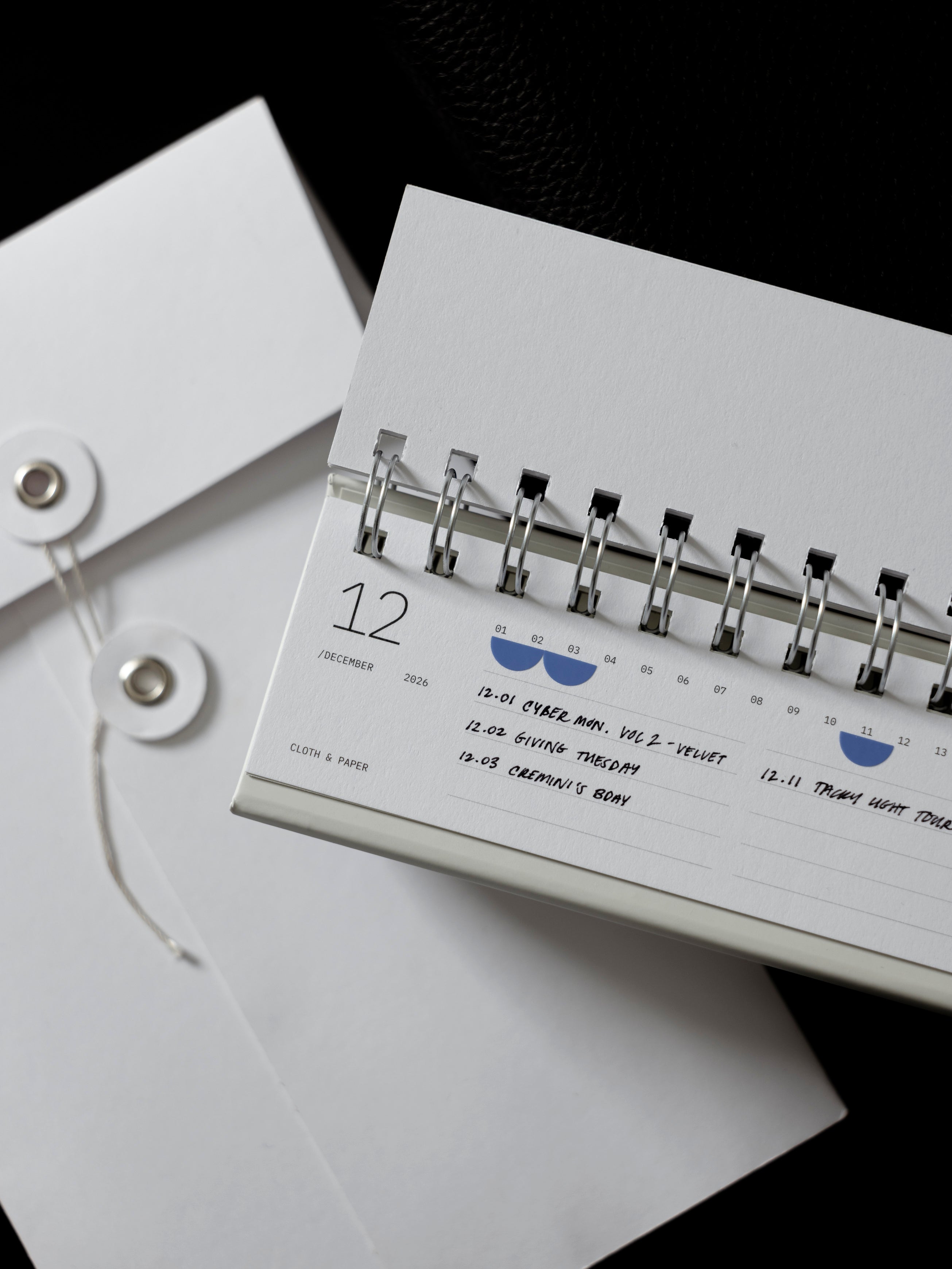 2026 Spiral Desk Calendar against a dark background.