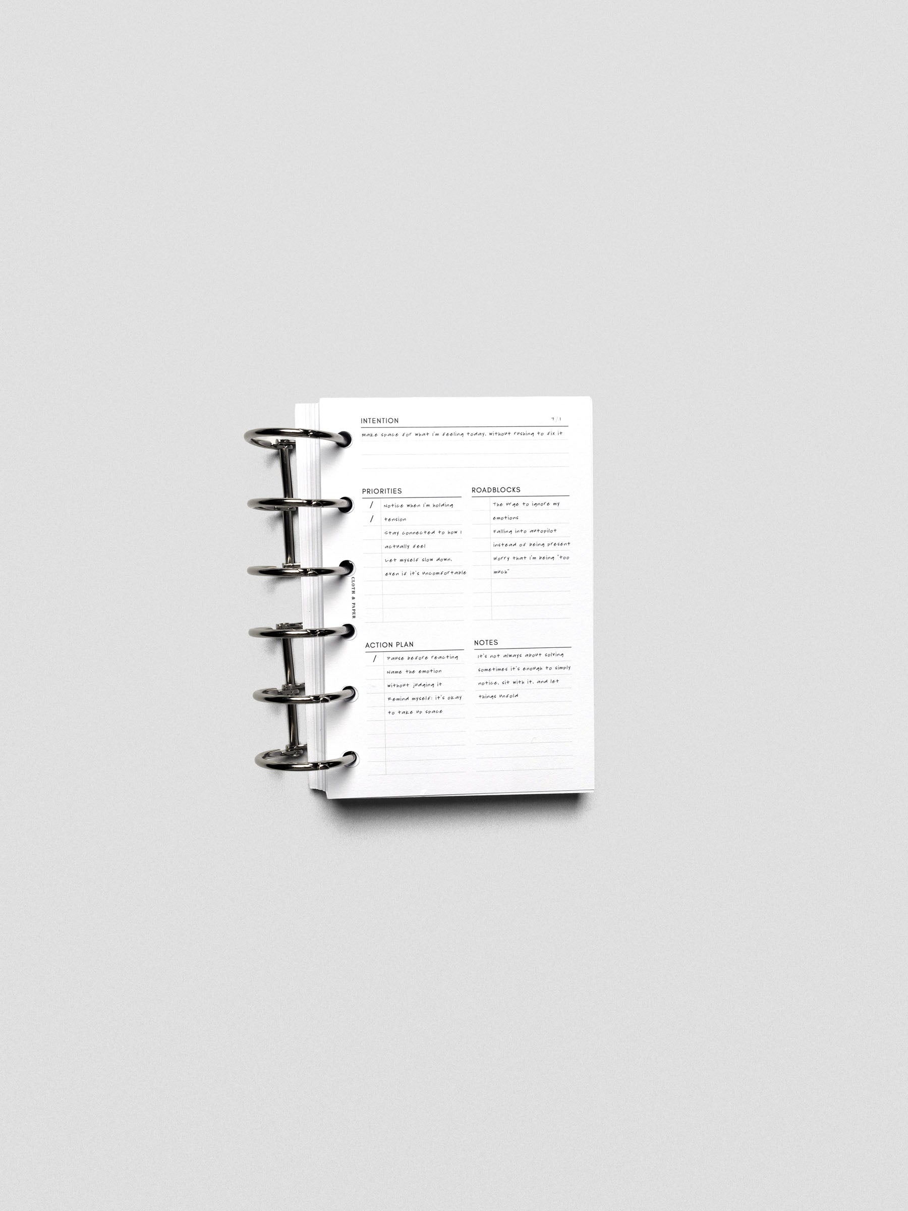 Daily Intention Planner Inserts show filled out in Pocket size ring bound.