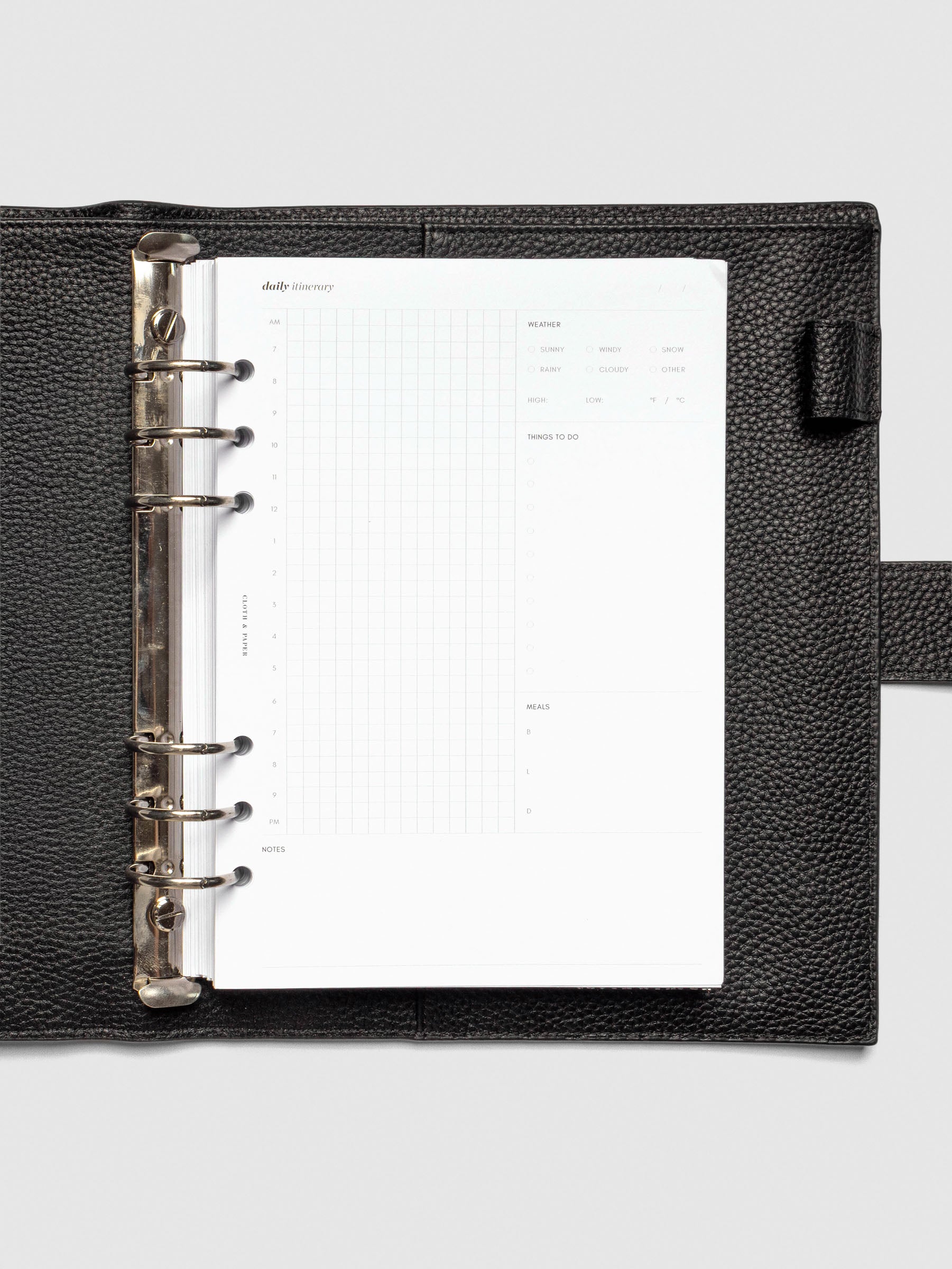 Insert in use inside a black leather folio.