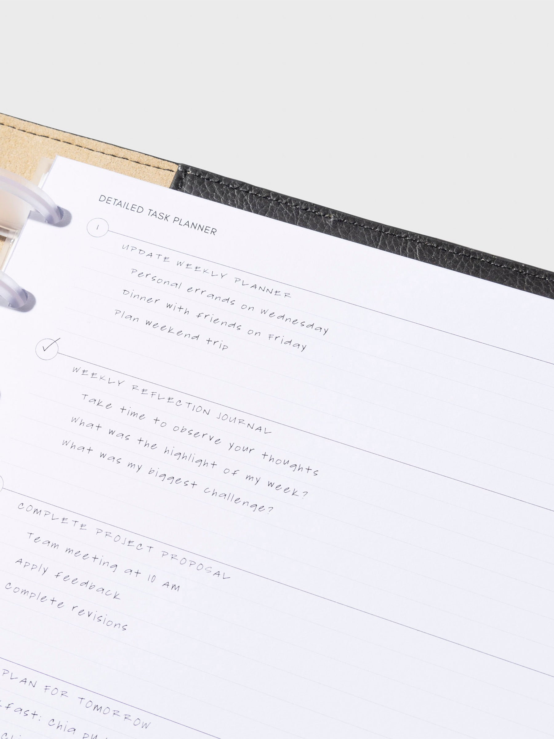 Insert in use inside a black leather folio. Size shown is HP Classic.