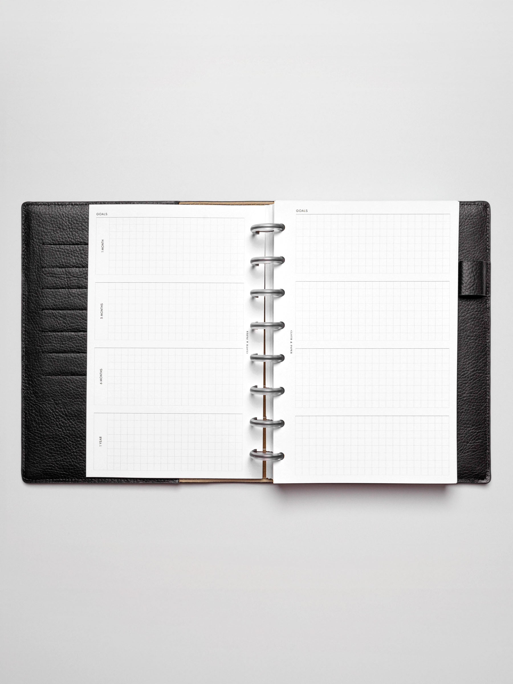 Insert in use inside a discbound planner system. Size shown is HalfLetter.