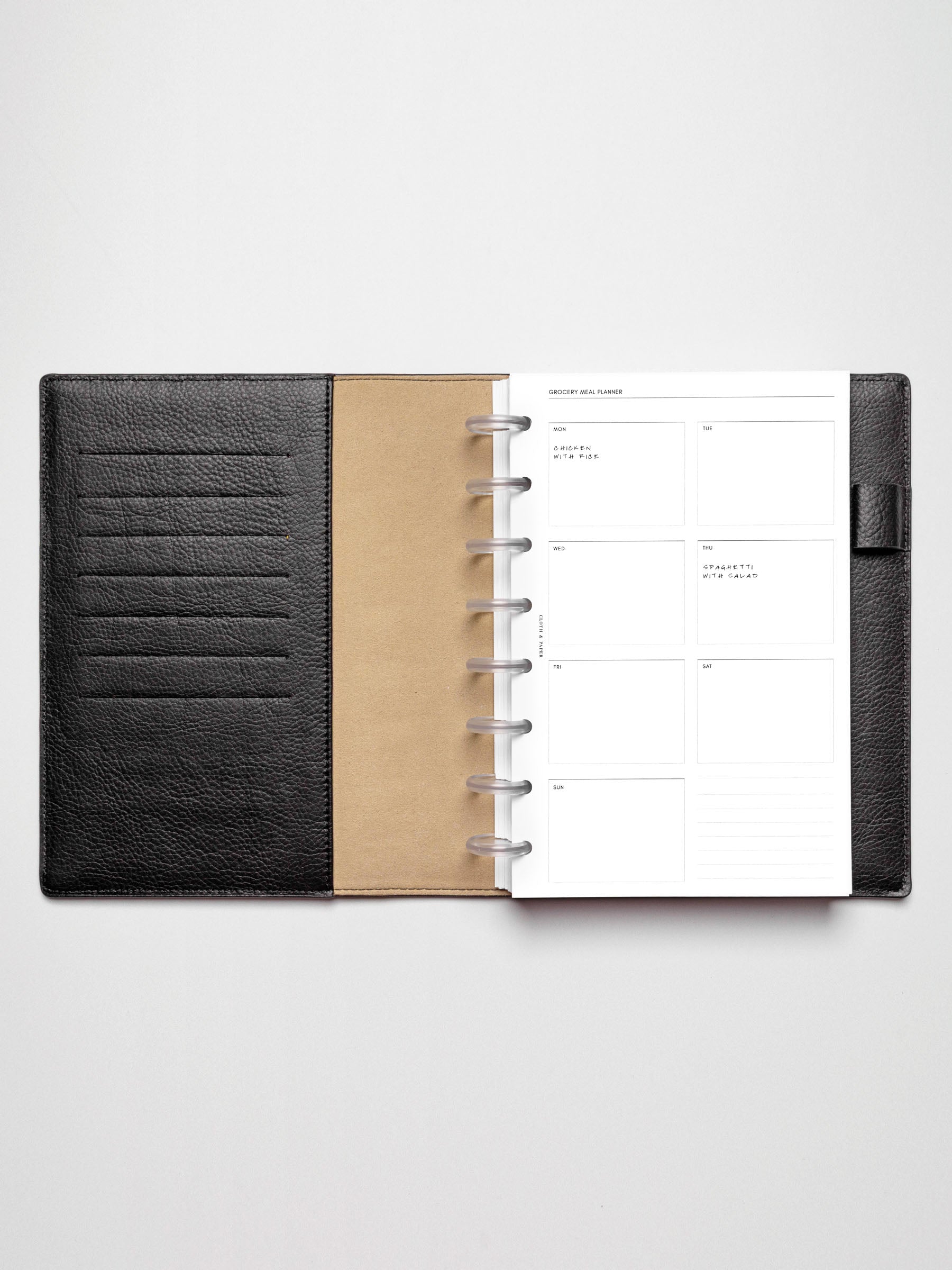 Grocery Meal Planner Insert inside an opened planner.