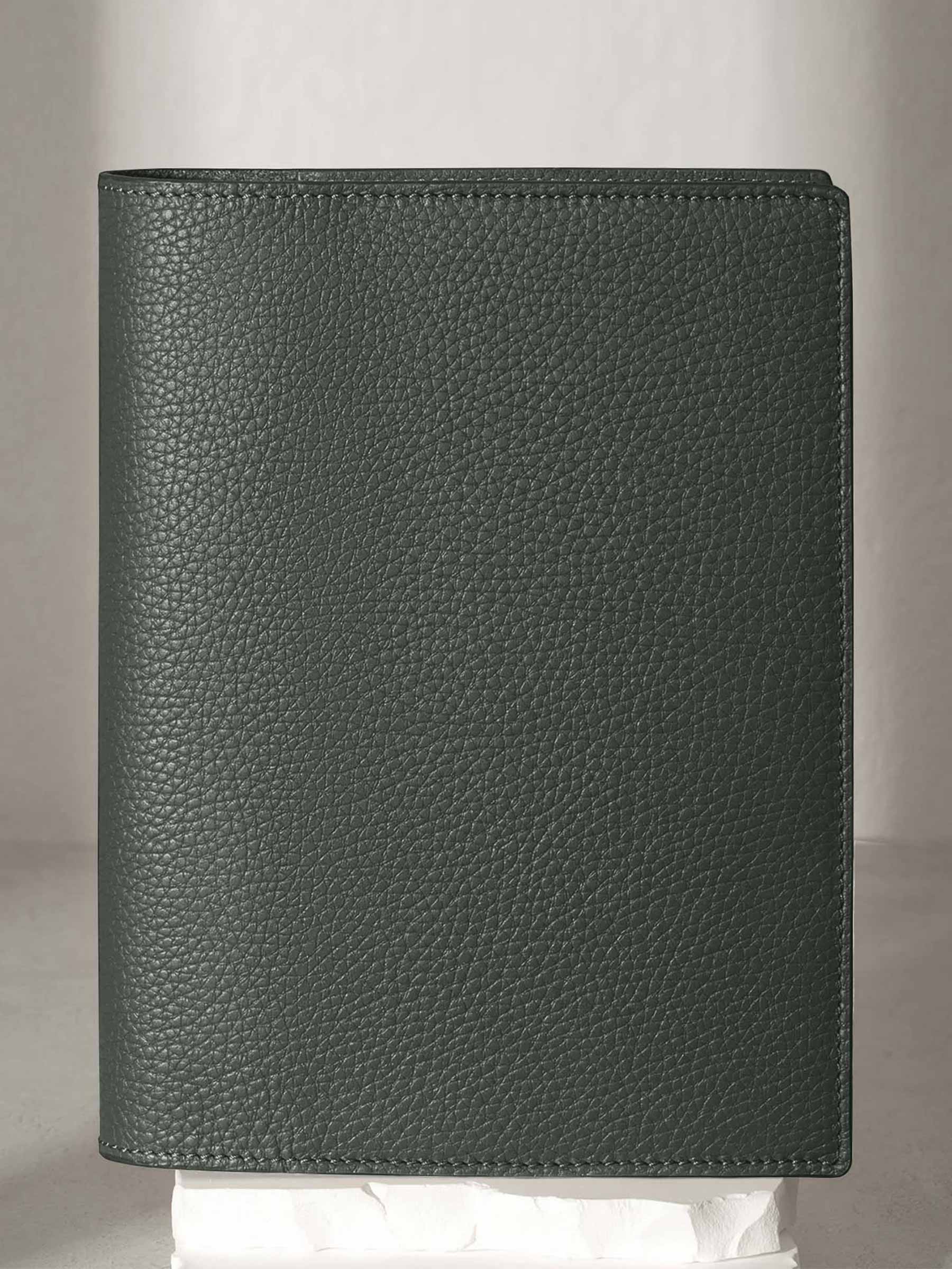 Large folio displayed on a neutral background.