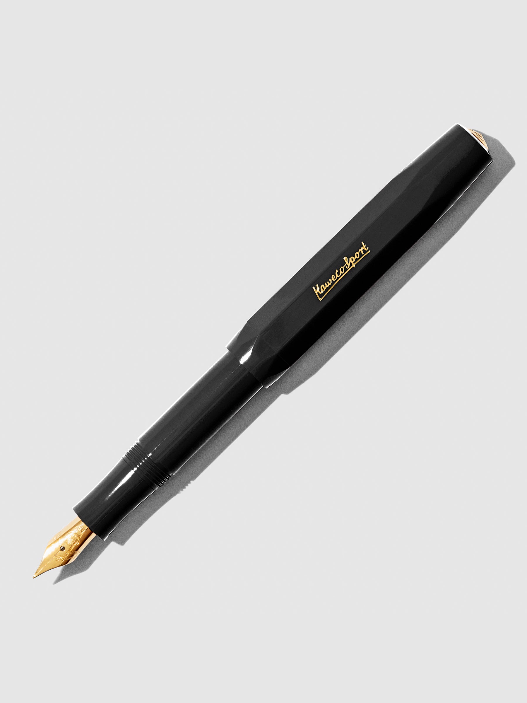 Black Extra Fine Nib pen displayed on a neutral background.