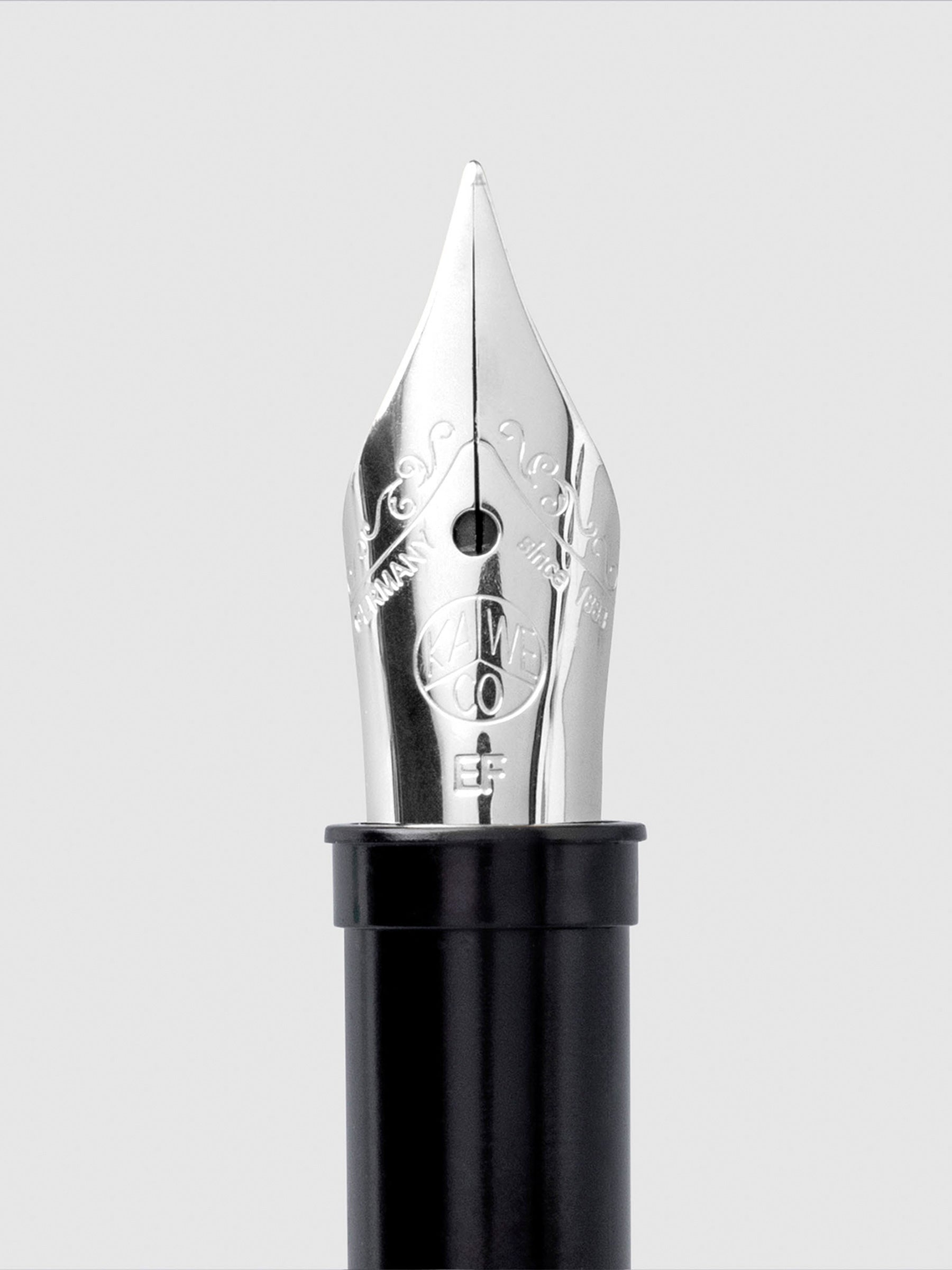 Silver extra fine nib displayed on a neutral background.