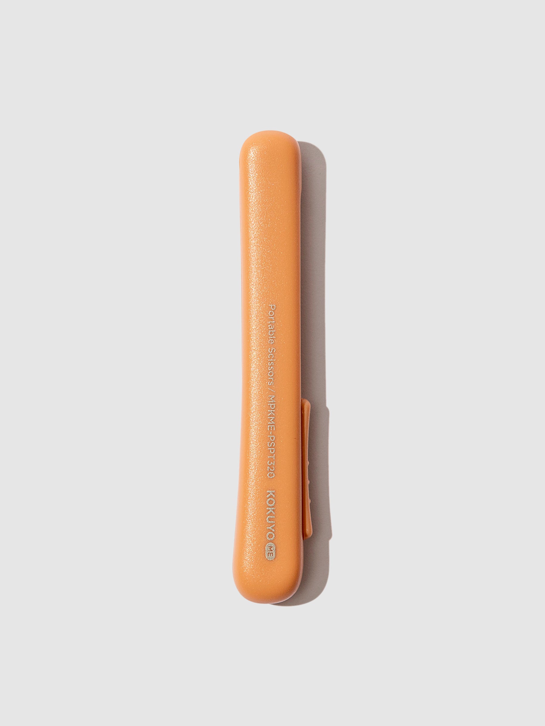 Scissors retracted and displayed on a neutral background. Color shown is Kurumi Brown. 