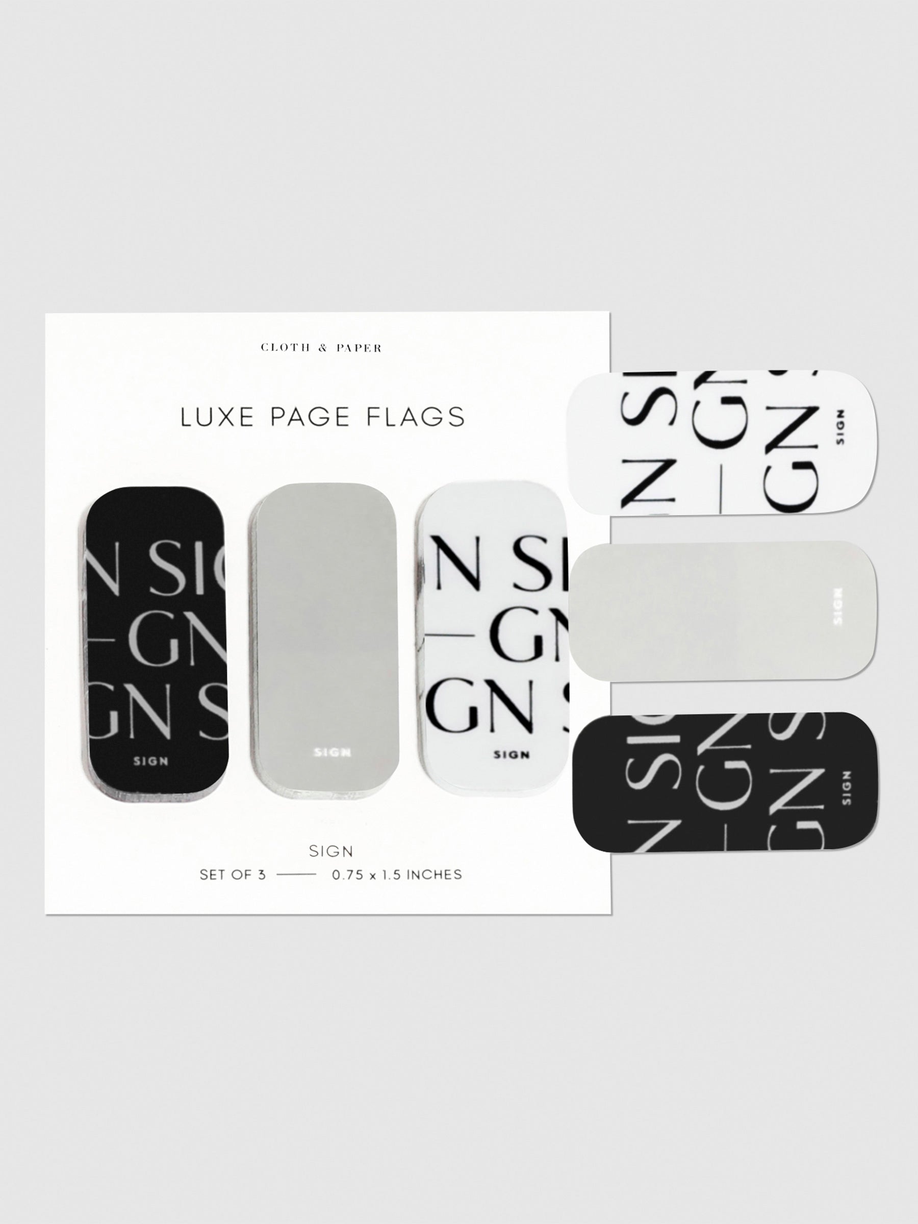Sign page flags on their backings on a neutral background. One of each flag is stuck to the right side of the backing.