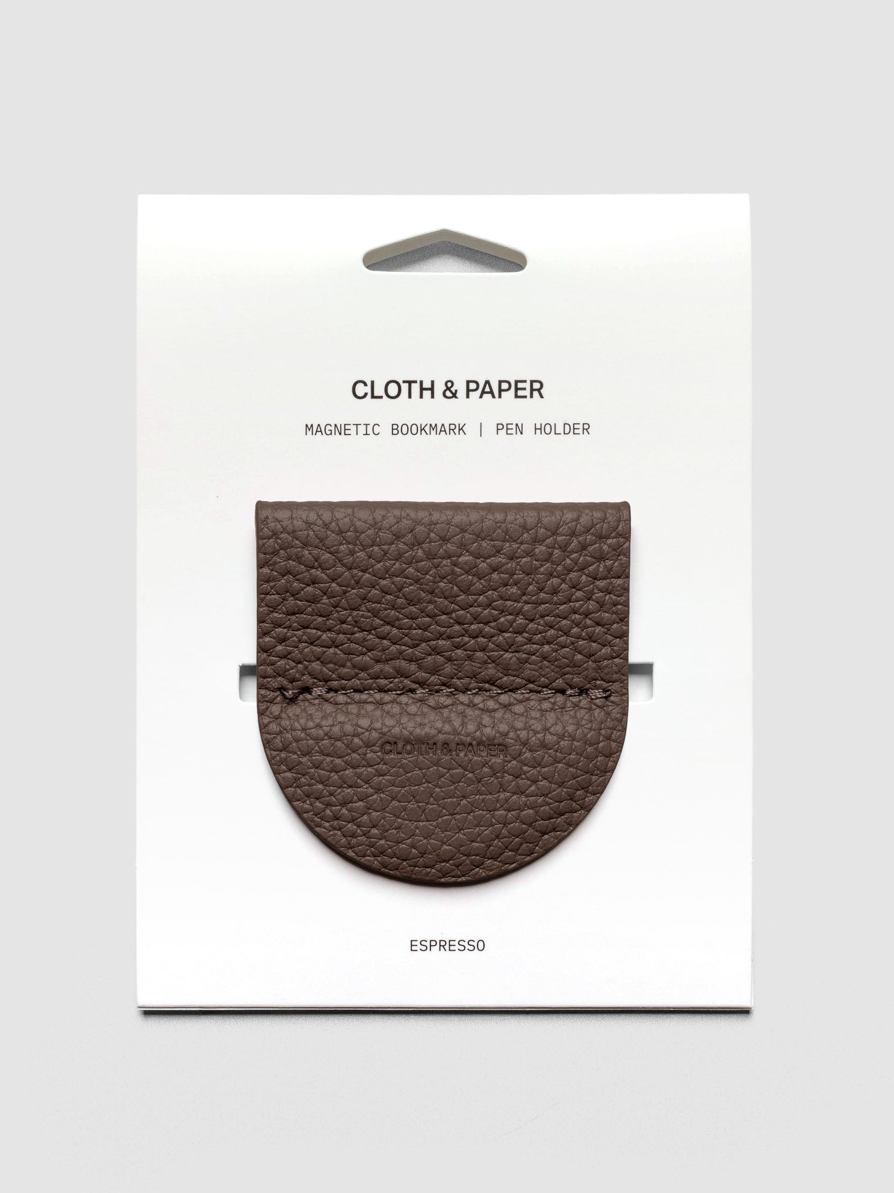 Magnetic Bookmark | Pen Holder in Espresso, a dark brown, displayed on a white backing card against a neutral background.