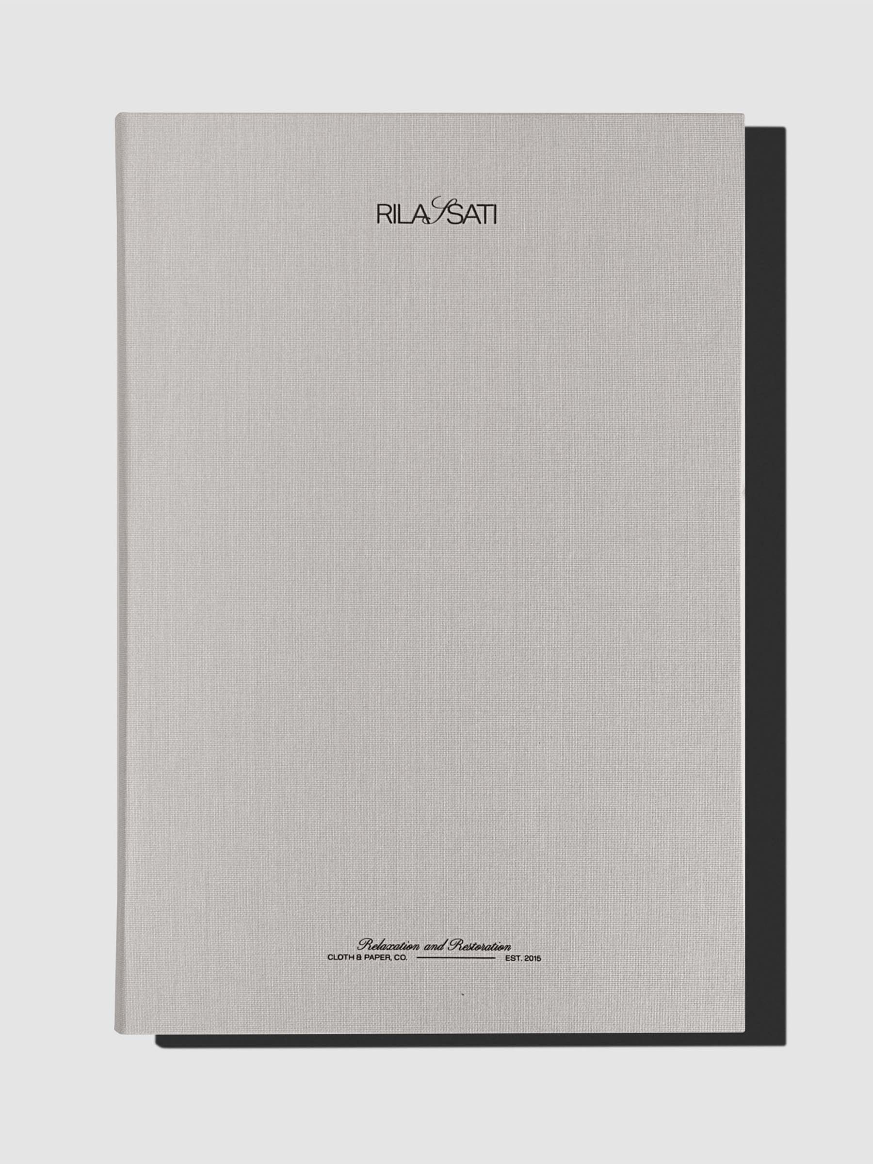 Folio displayed closed on a neutral background.