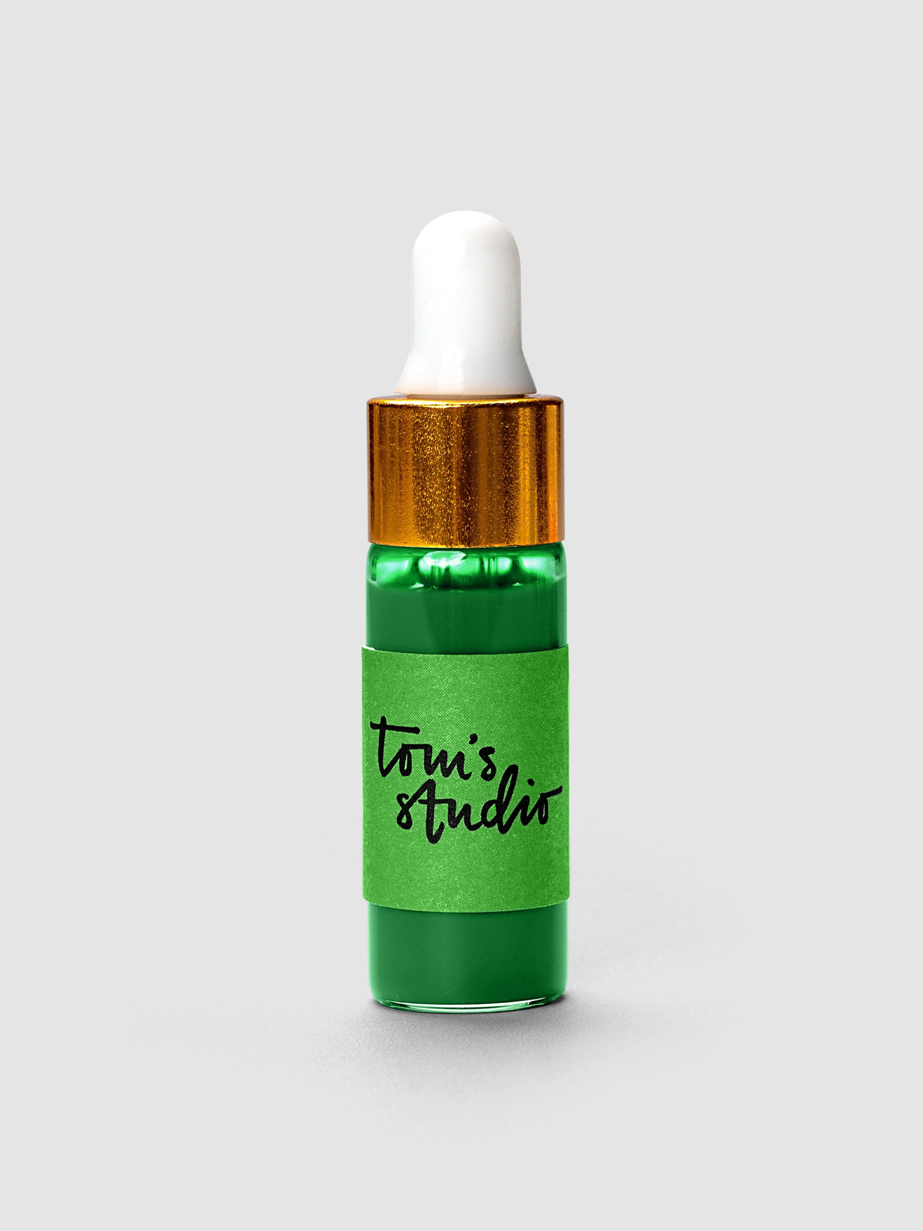 Tom's Studio Mini Highlighter Ink bottle with gold cap and white dropper in green