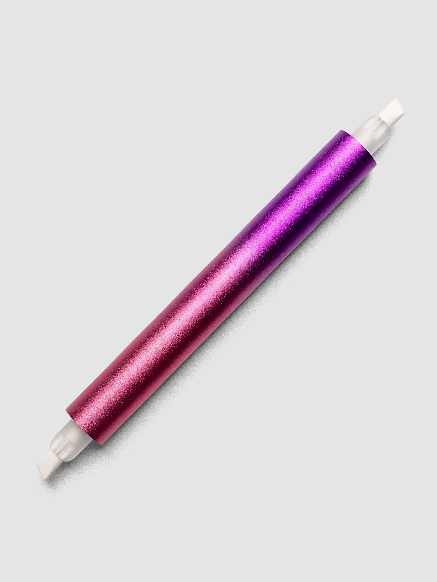 Tom's Studio Ori Refillable Highlighter close up of purple and pink ombre barrel with white chisel tip