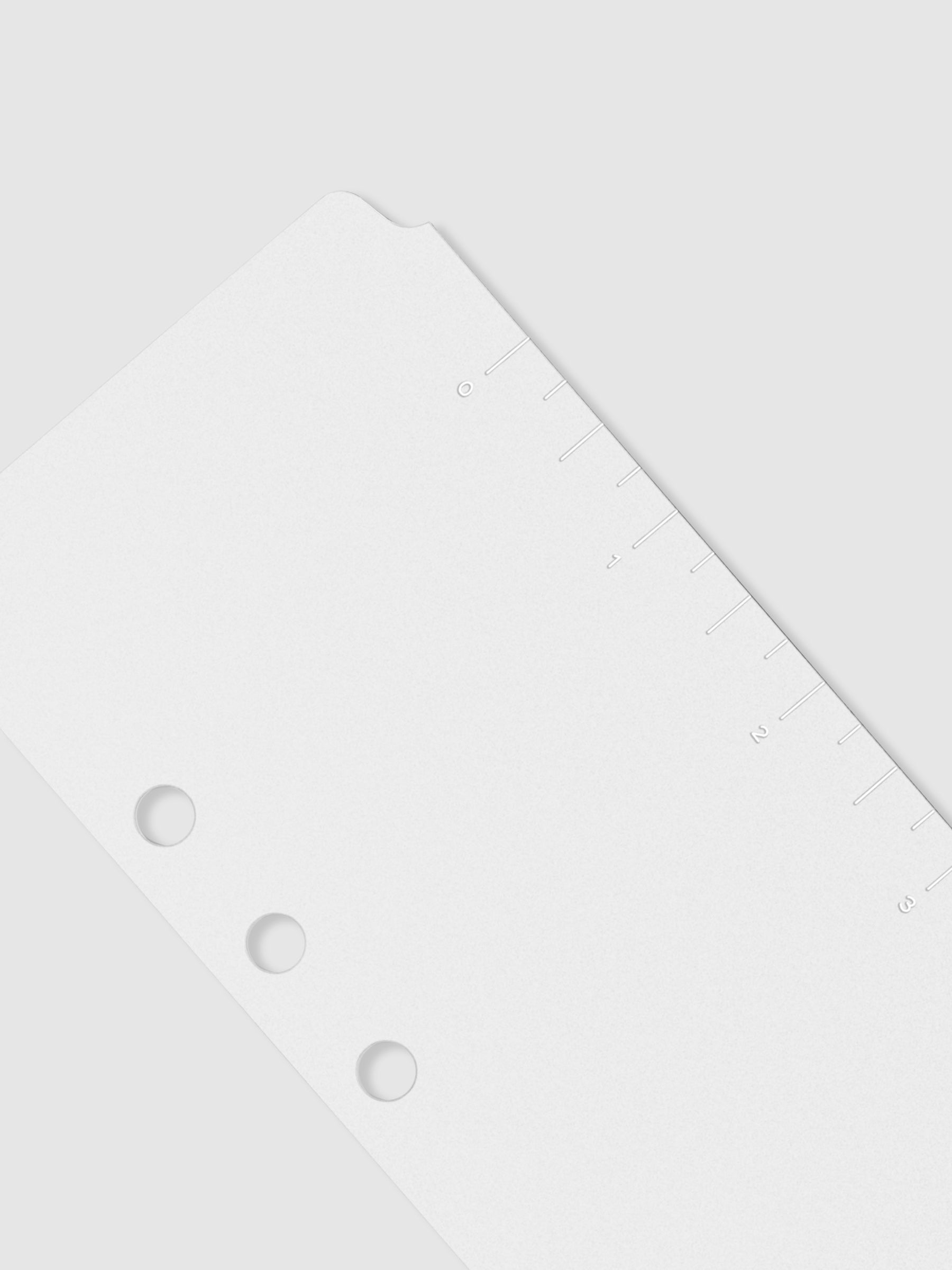 Closeup of page marker on a neutral background.