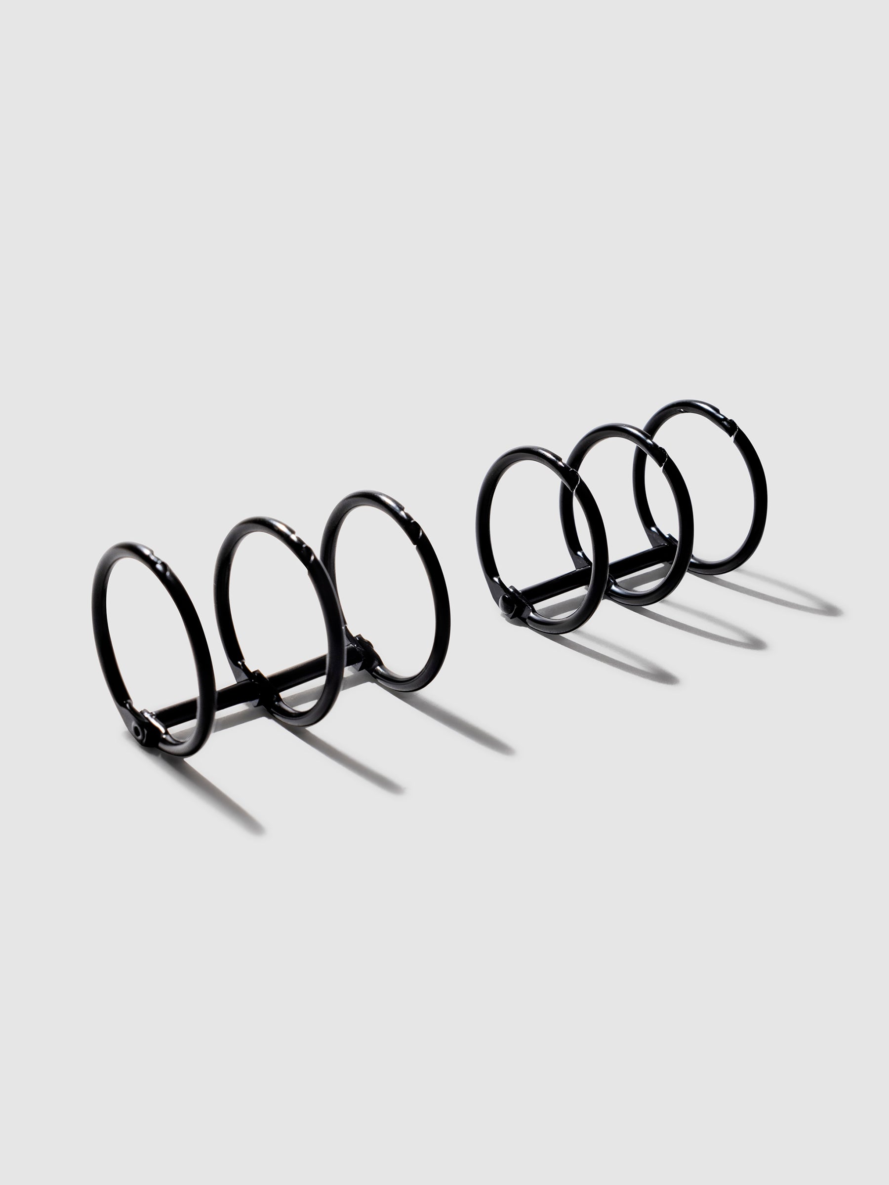 Planner Rings, Cloth and Paper. Black rings displayed on a neutral background.