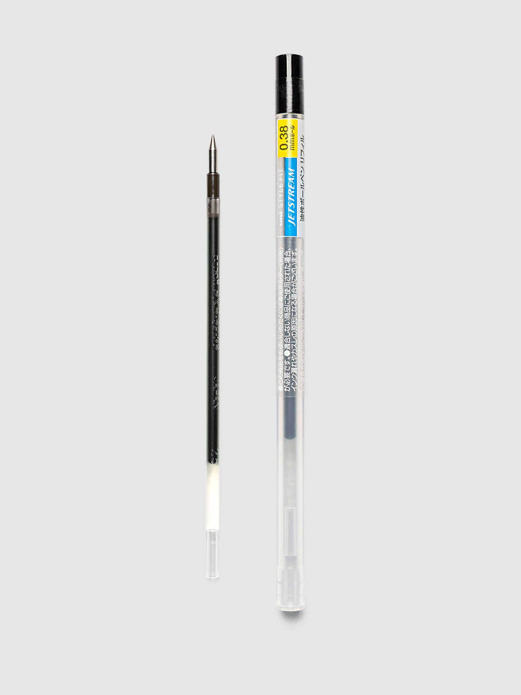 Uni-ball SXR-89-38 Style Fit Jetstream Pen Refill in black shown next to packaged tube with printed label